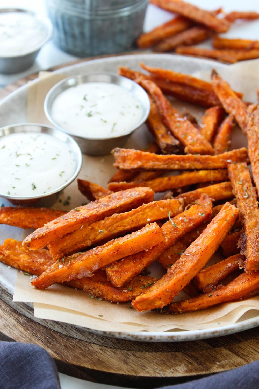 Close‑up of crispy oven baked sweet potato fries showing golden, crunchy edges