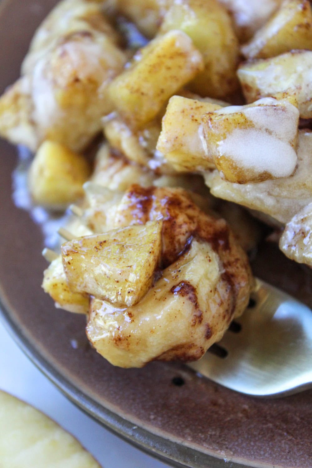 Gooey apple cinnamon roll bake with glaze