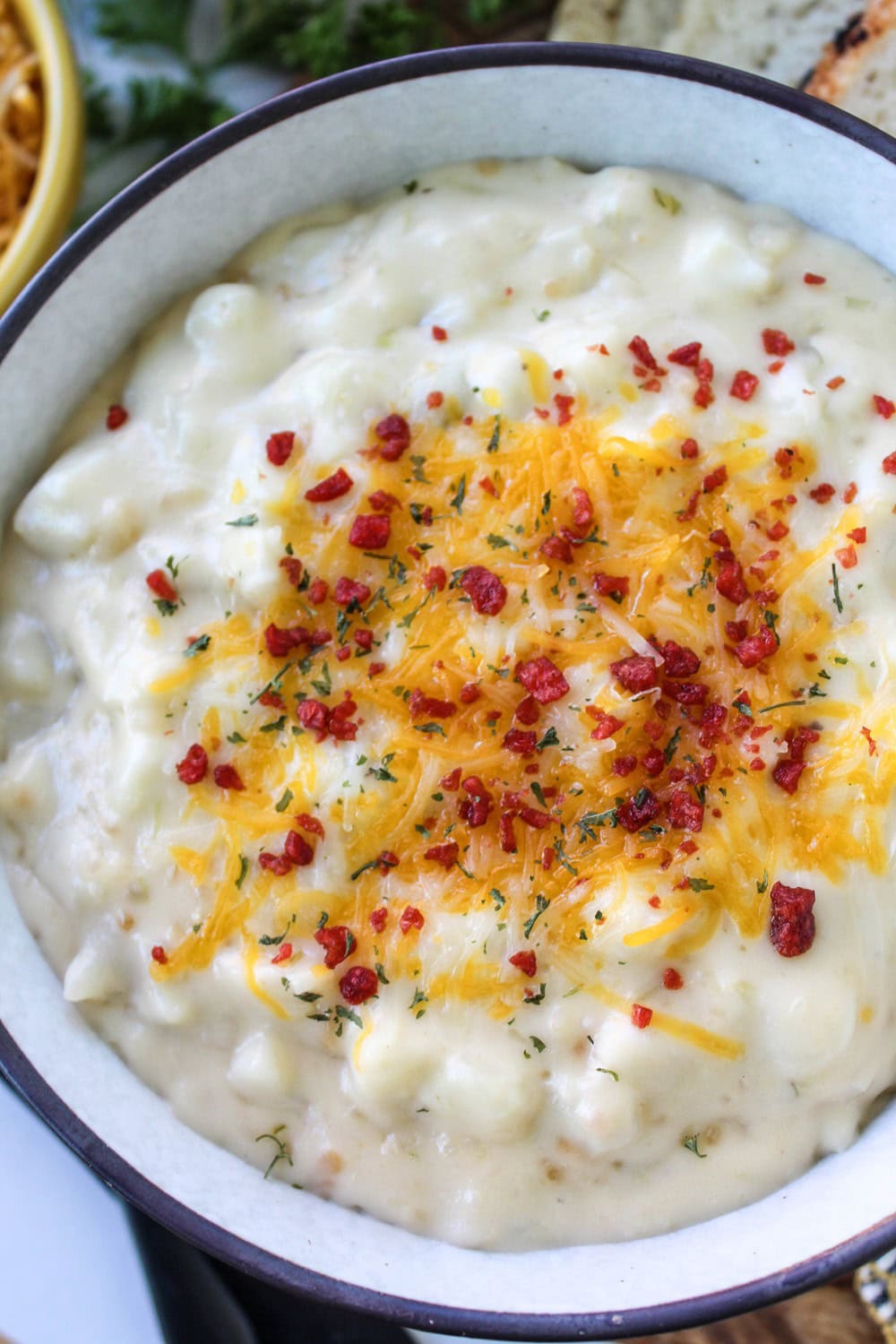 Easy cheesy potato soup on a cozy fall table setting