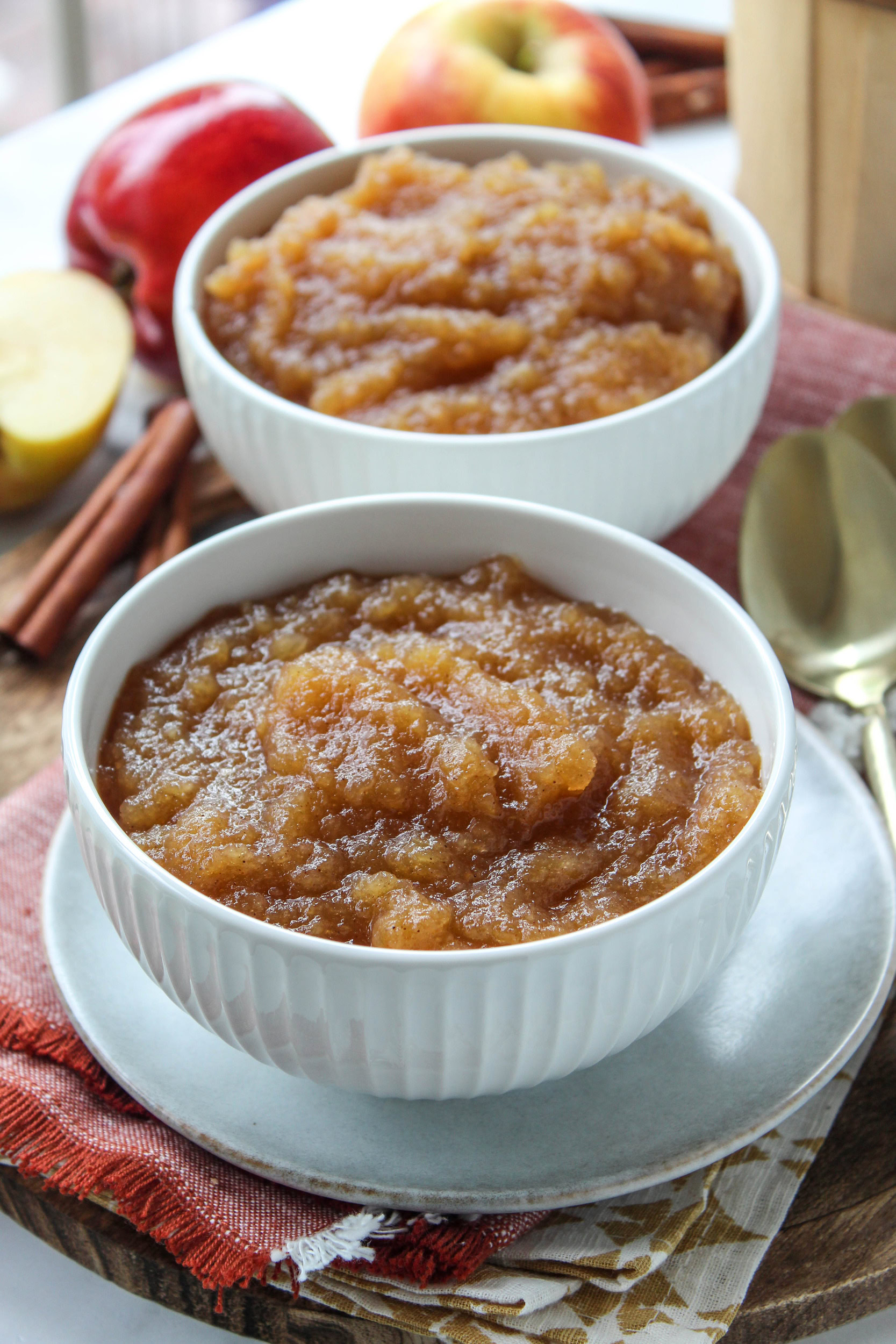 Bowl of homemade applesauce with a smooth, golden texture