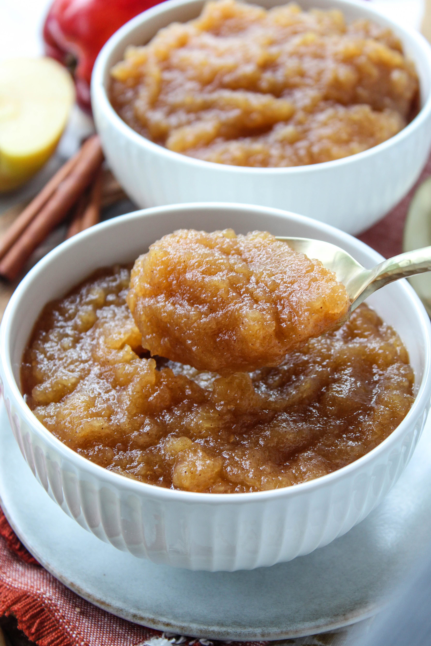 Spoonful of cozy homemade applesauce showing soft, mashed apples