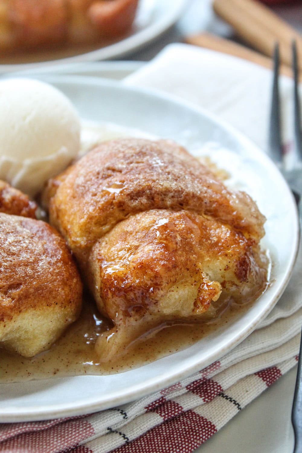 Baked apple dumplings served warm with a sweet sauce