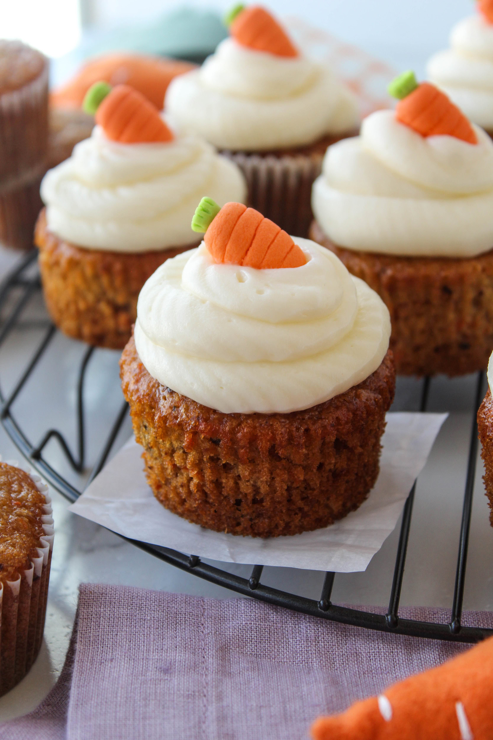 Close‑up of carrot cake cupcakes with cream cheese frosting