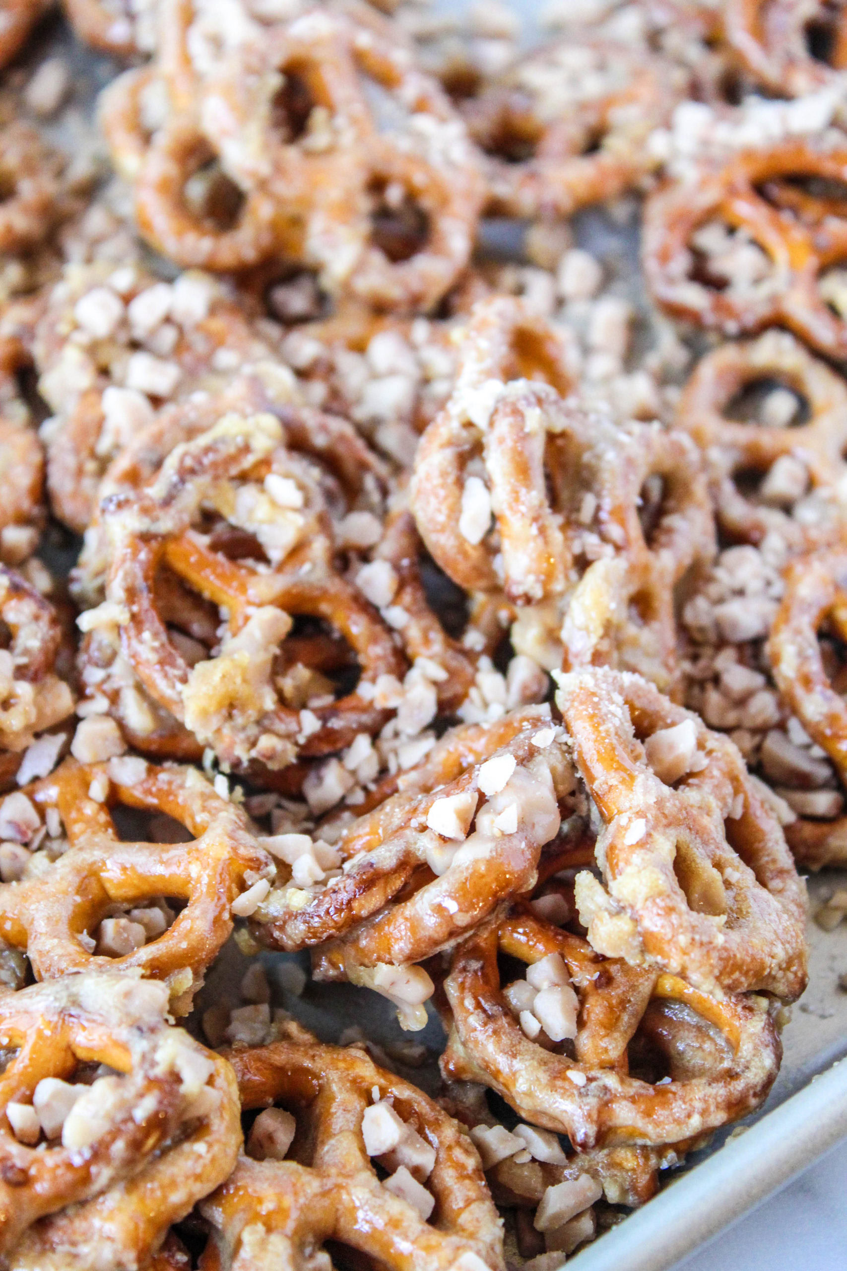Butter toffee pretzels on a baking sheet