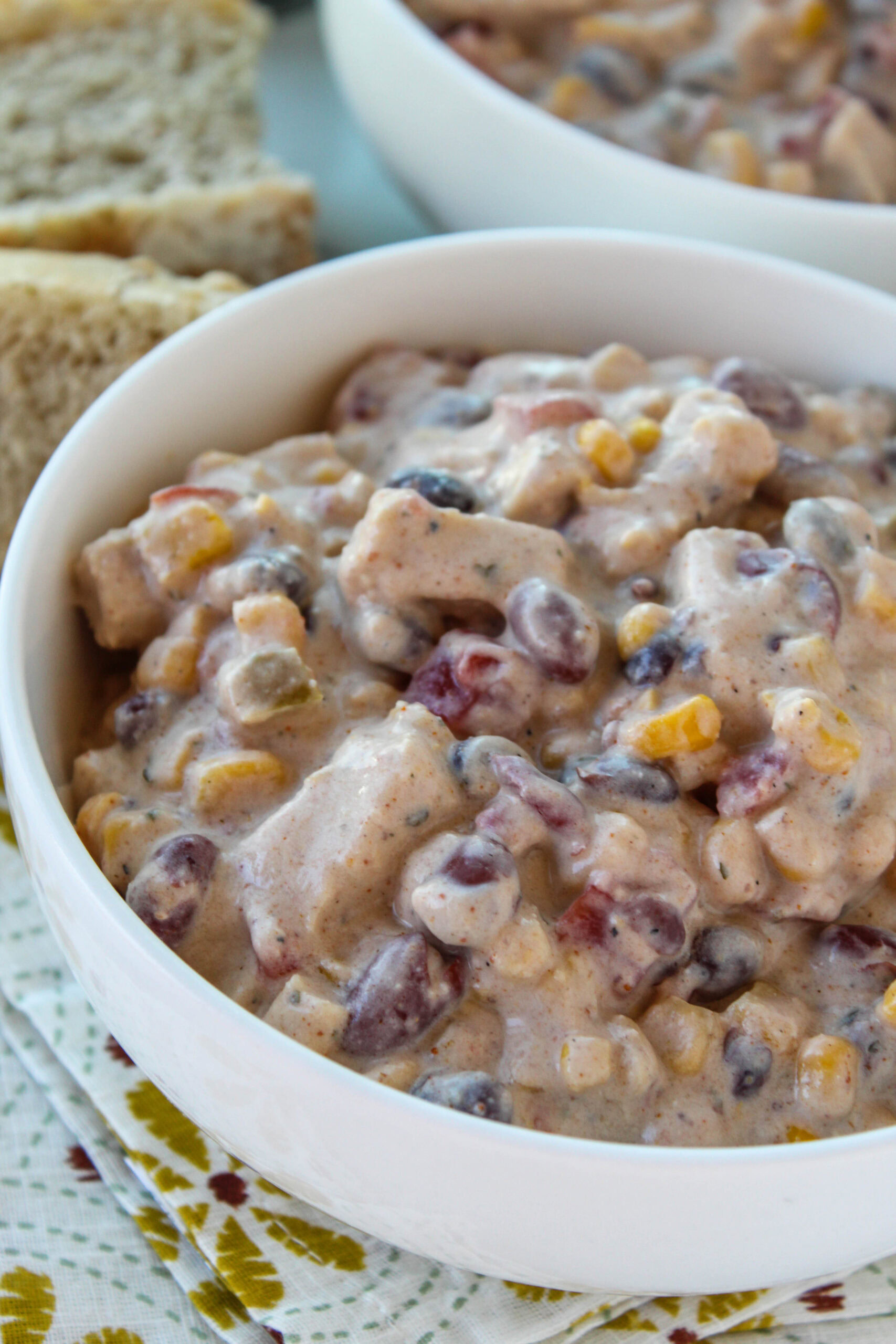 Thick vegetarian chicken chili showing plant‑based chicken pieces