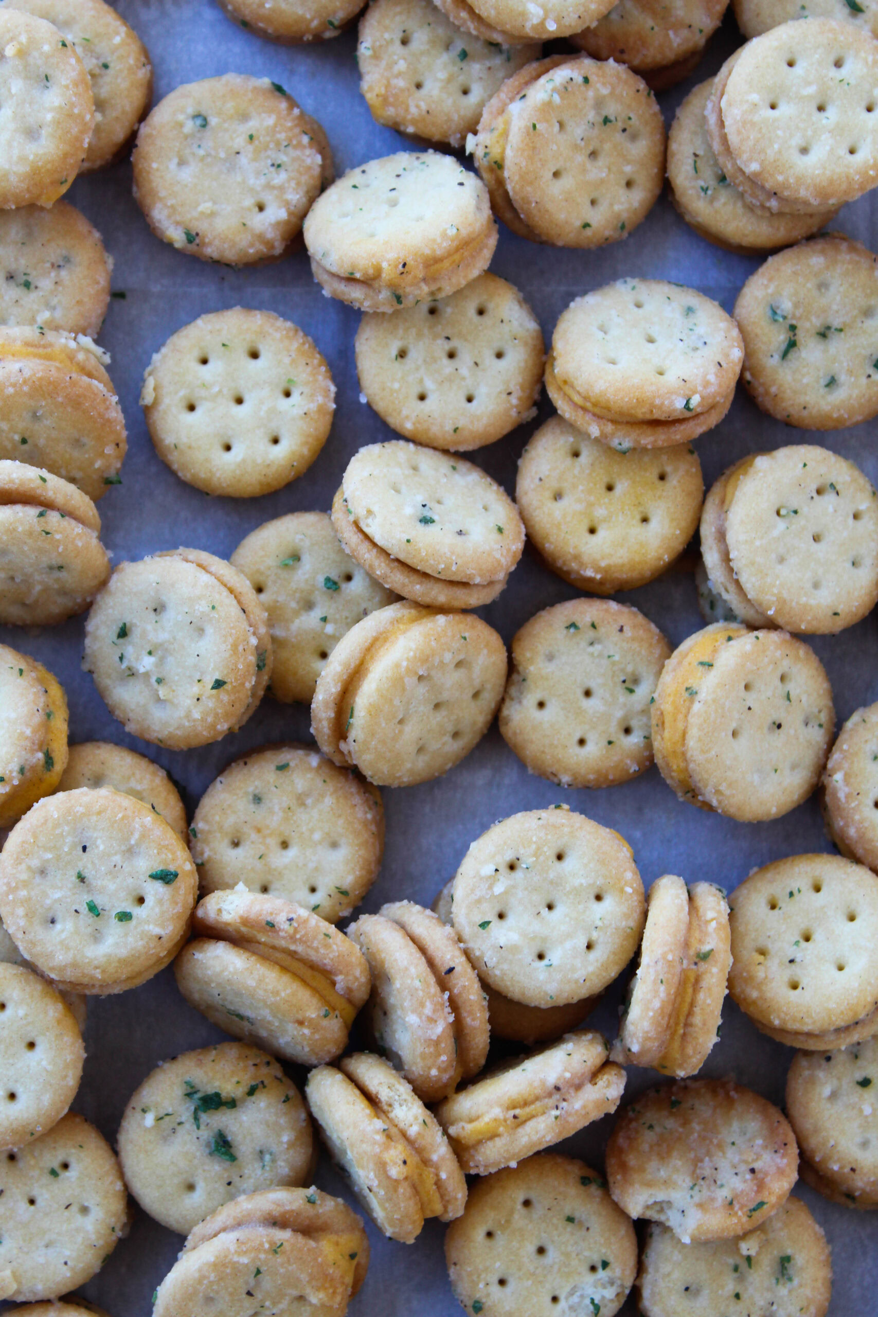 Close‑up of golden ranch crackers with a cheesy coating