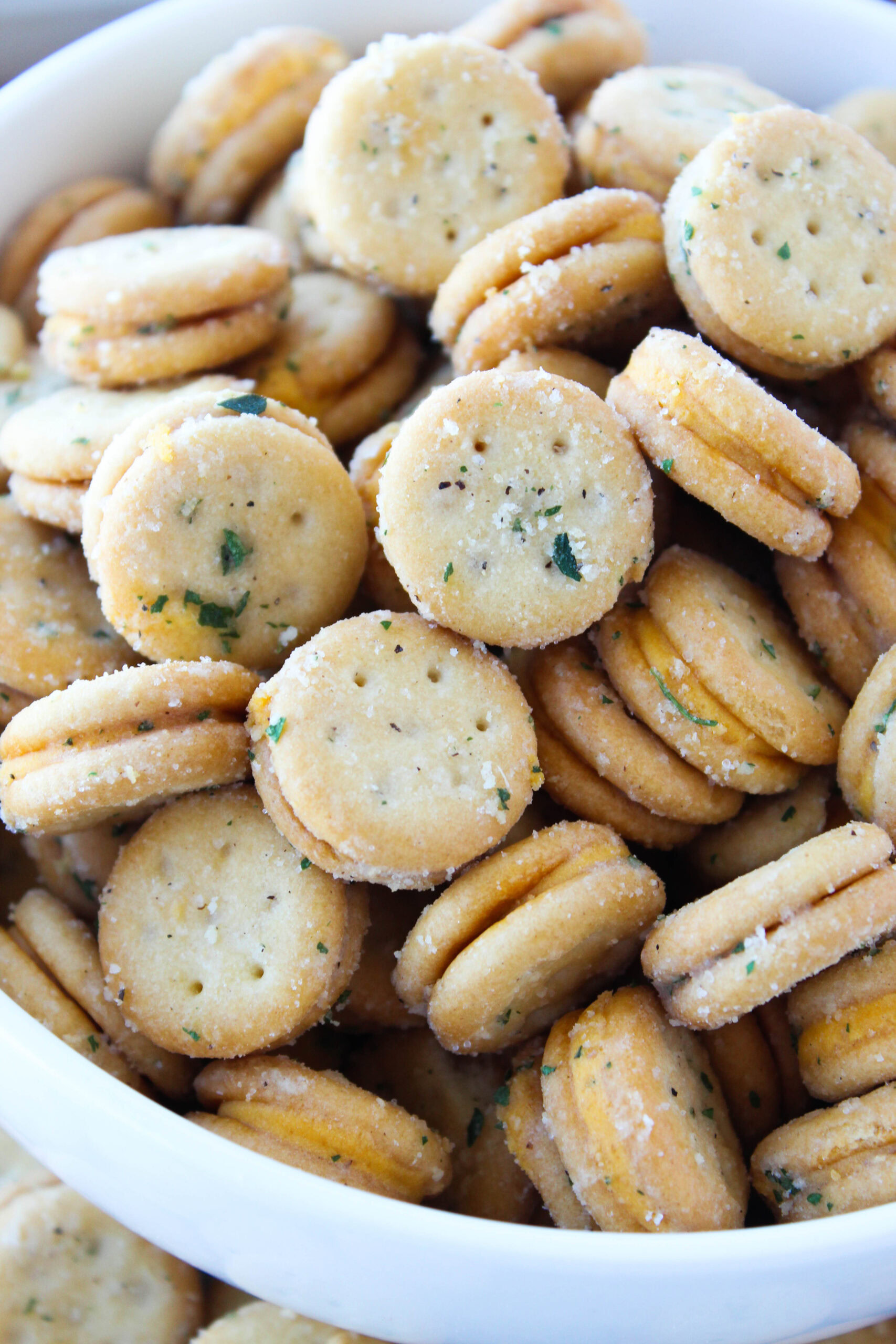 Bowl of crunchy cheesy ranch crackers ready for snacking