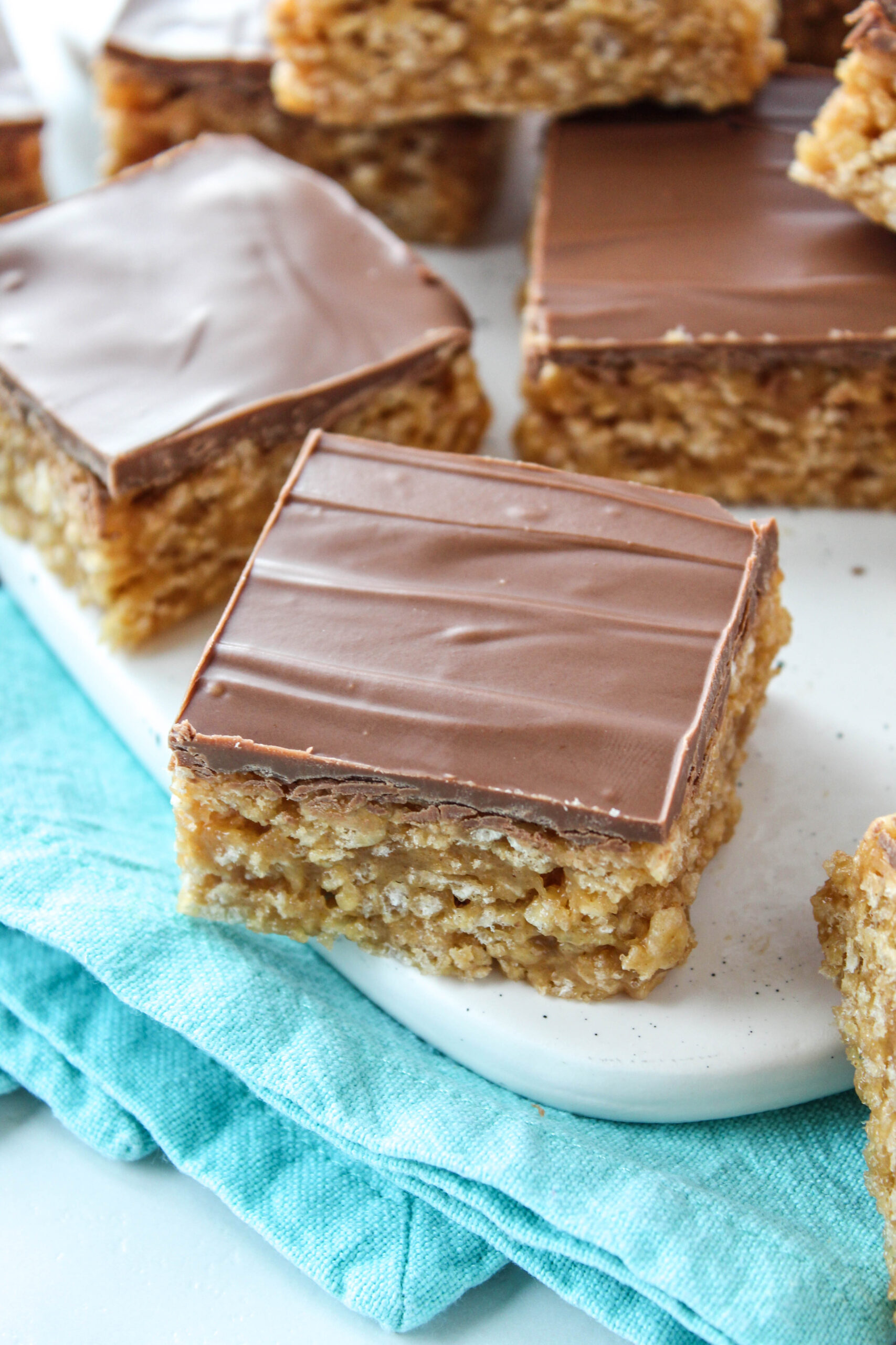 Soft Scotcheroo bar with glossy chocolate layer