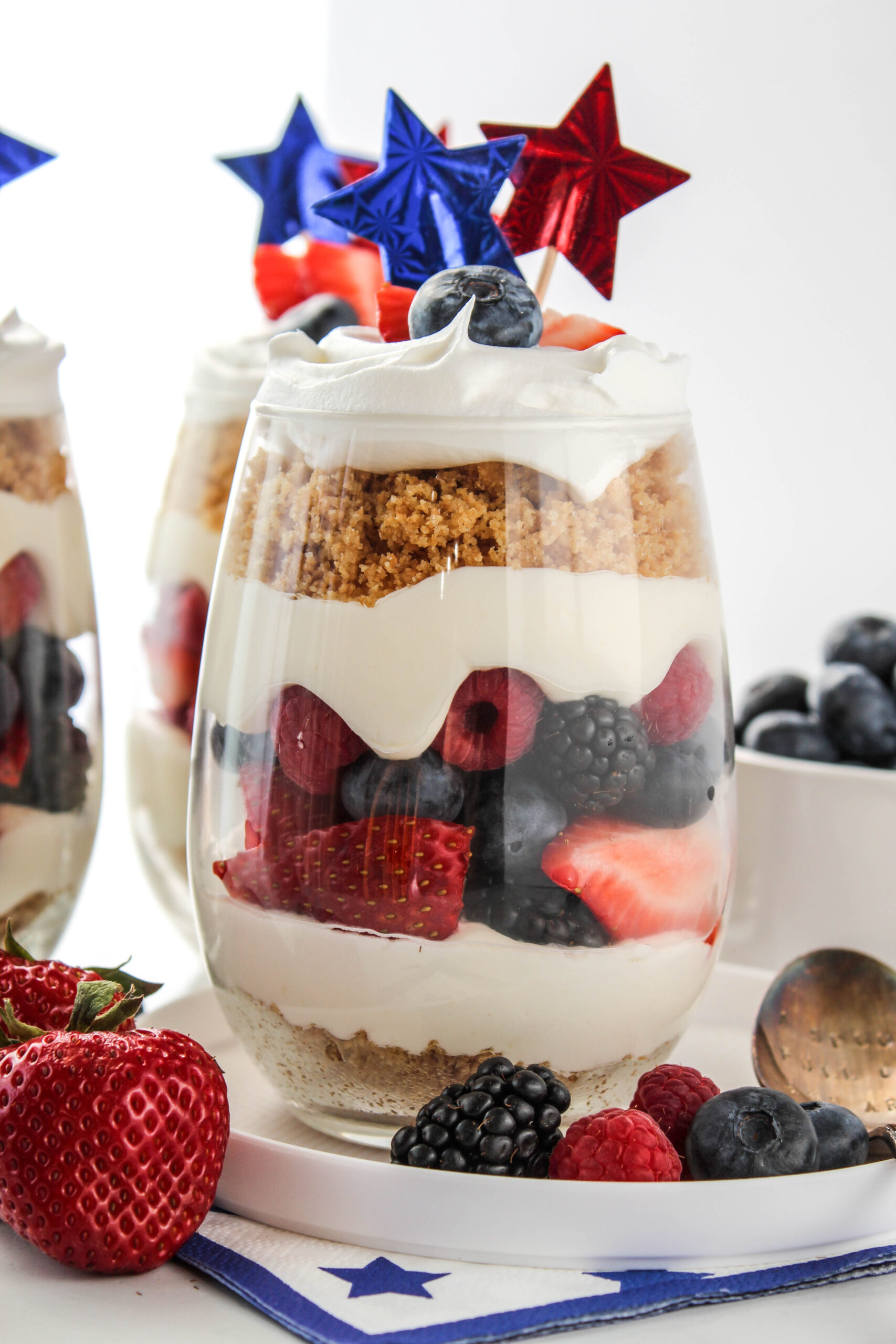 no bake cheesecake parfaits layered with fresh berries