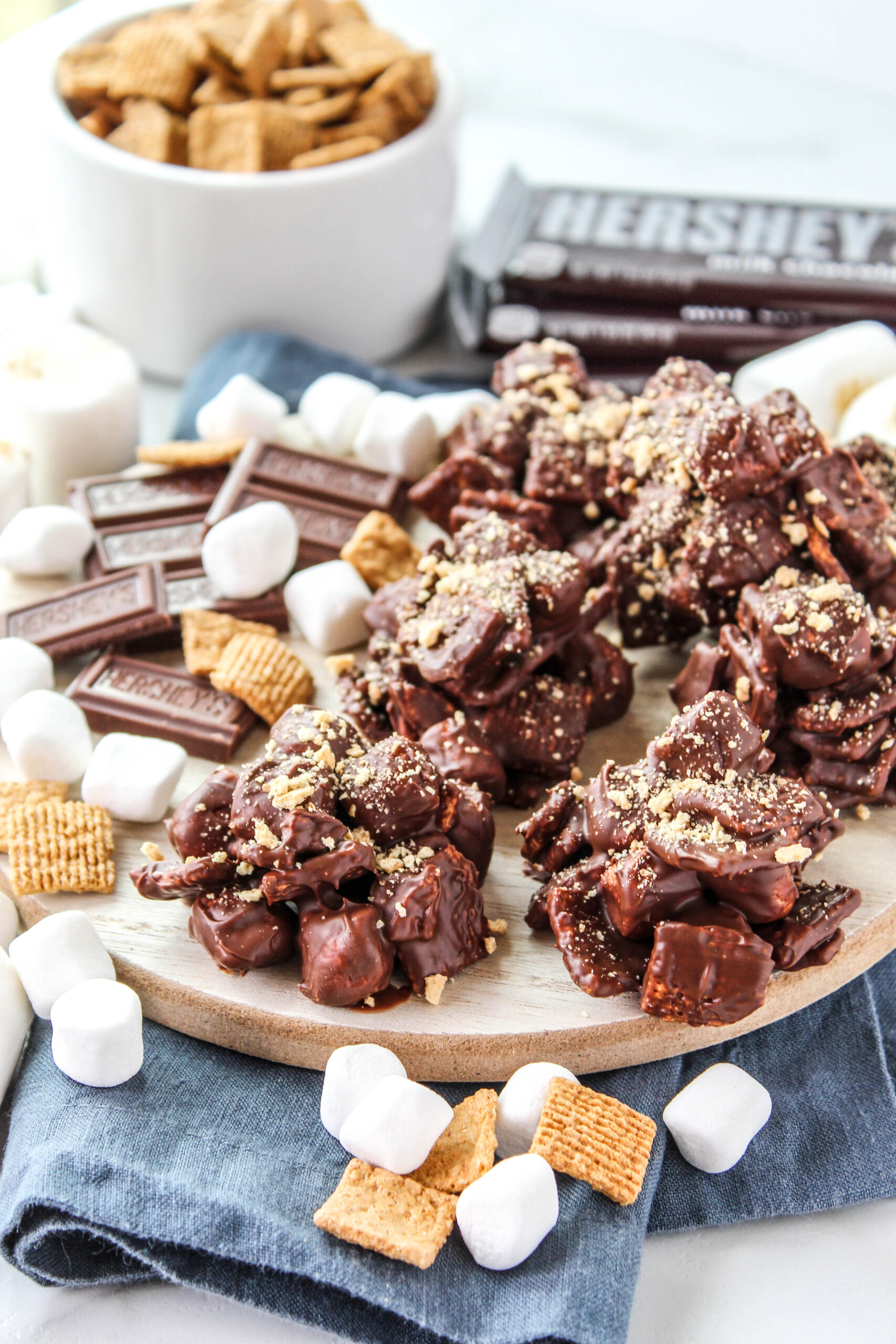 S’mores candy bites showing chocolate, marshmallows, and graham cereal