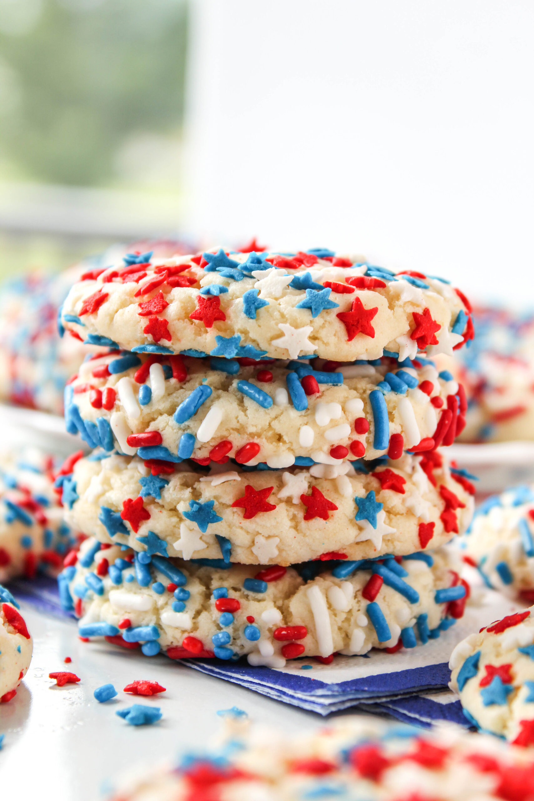 Chewy cake mix cookies filled with festive red white and blue sprinkles