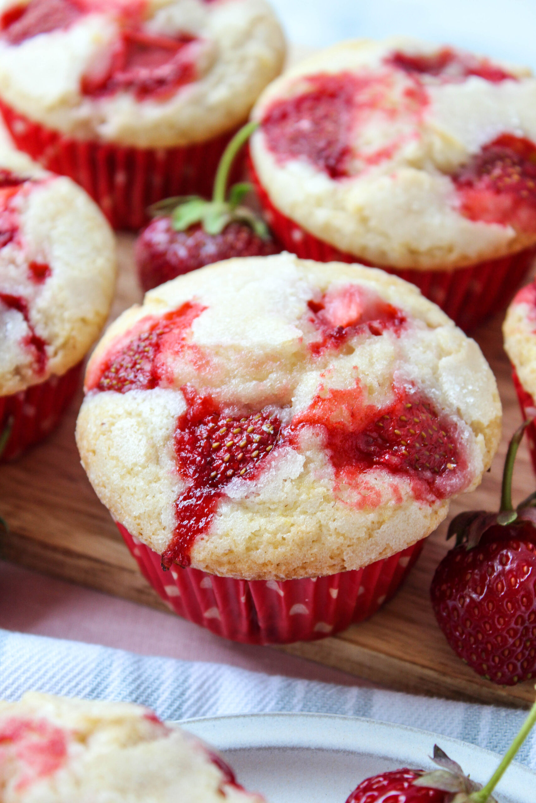 Fluffy strawberry muffins packed with fresh strawberries