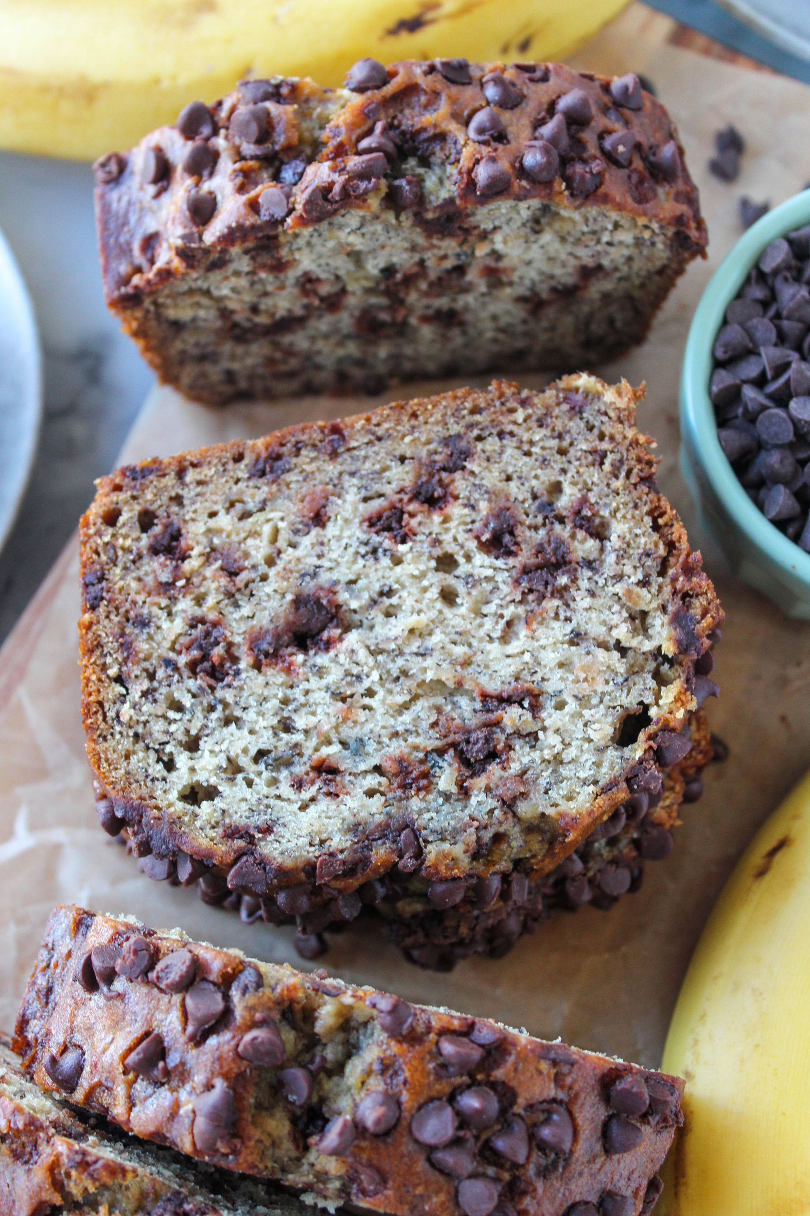Thick slice of chocolate chip banana bread with a tender crumb