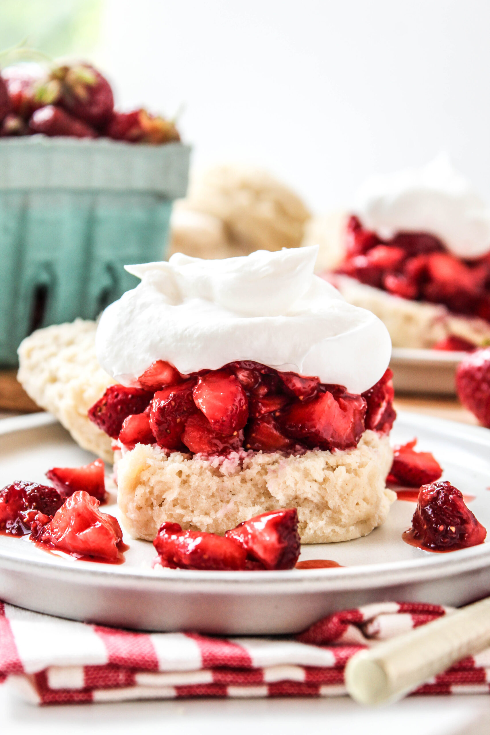 Classic strawberry shortcake layered with fresh strawberries and whipped cream