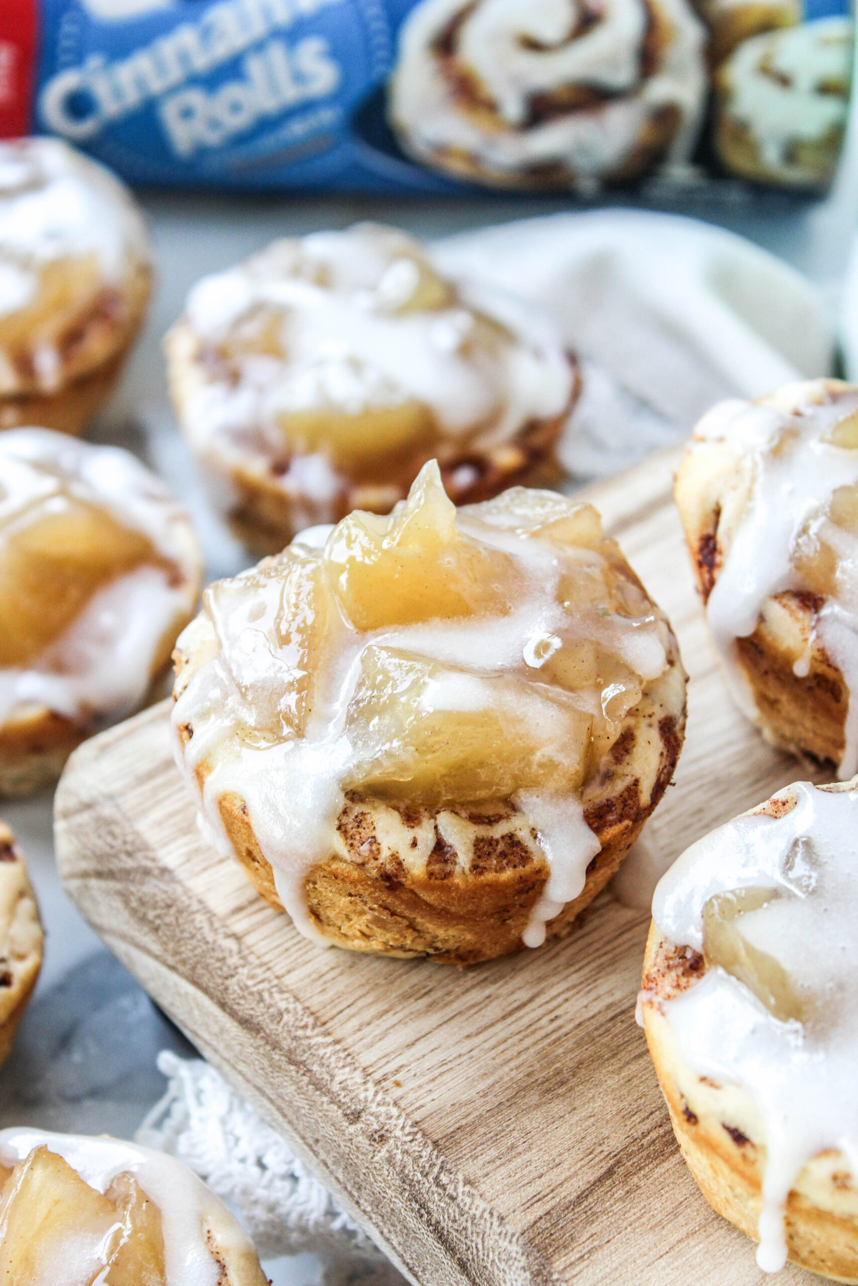 Golden apple pie cups made from canned cinnamon rolls and apple pie filling