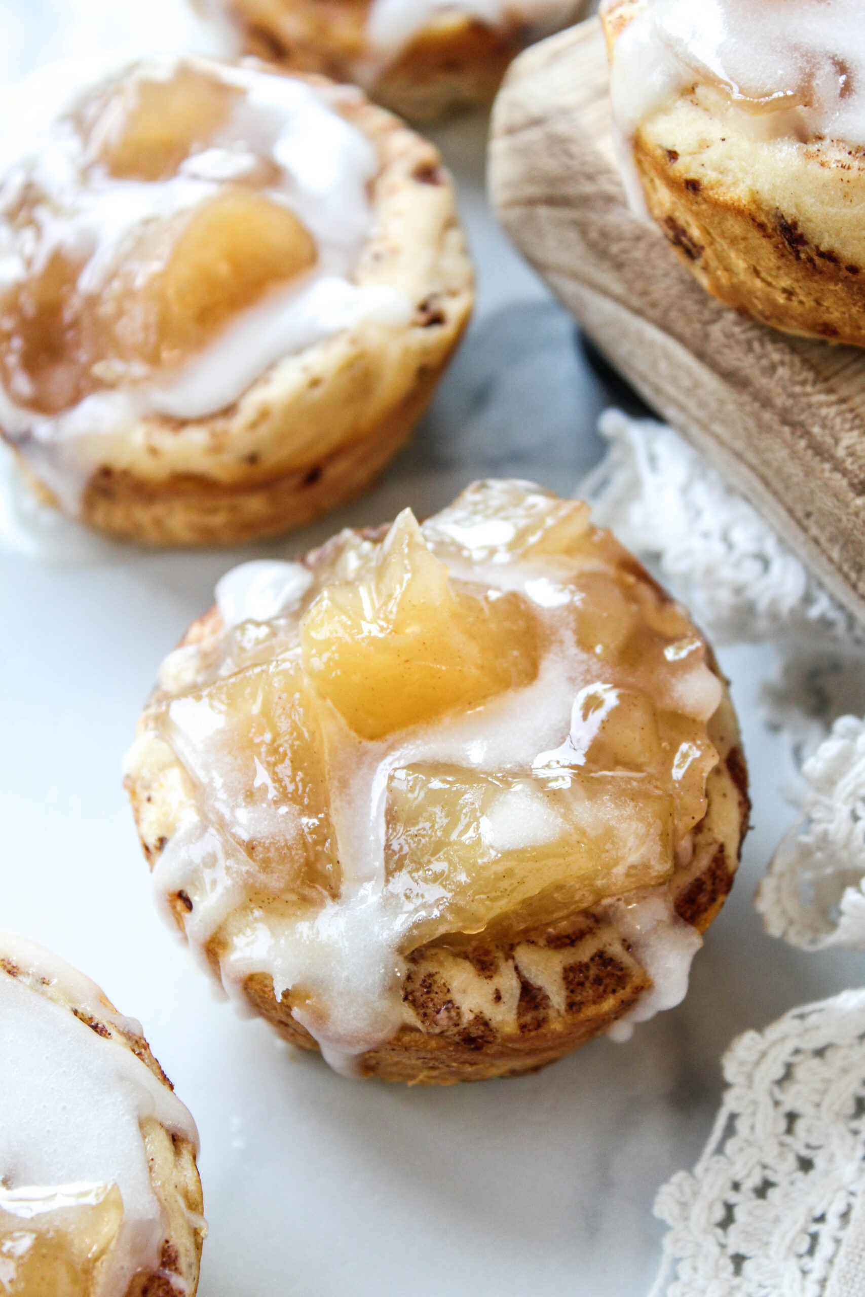Mini apple pie cups with cinnamon swirls and tender apple centers