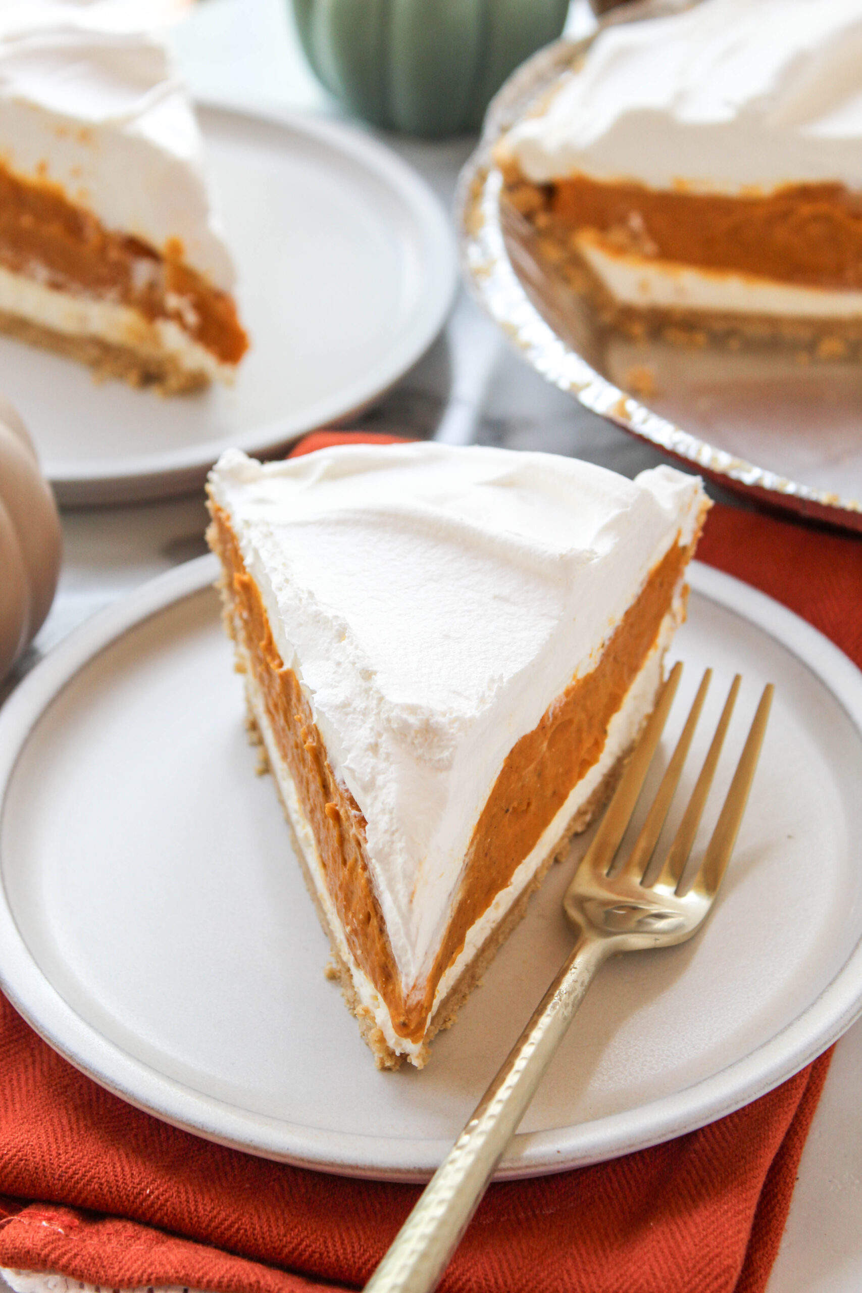 Homemade no-bake pumpkin pie featuring three rich and creamy layers