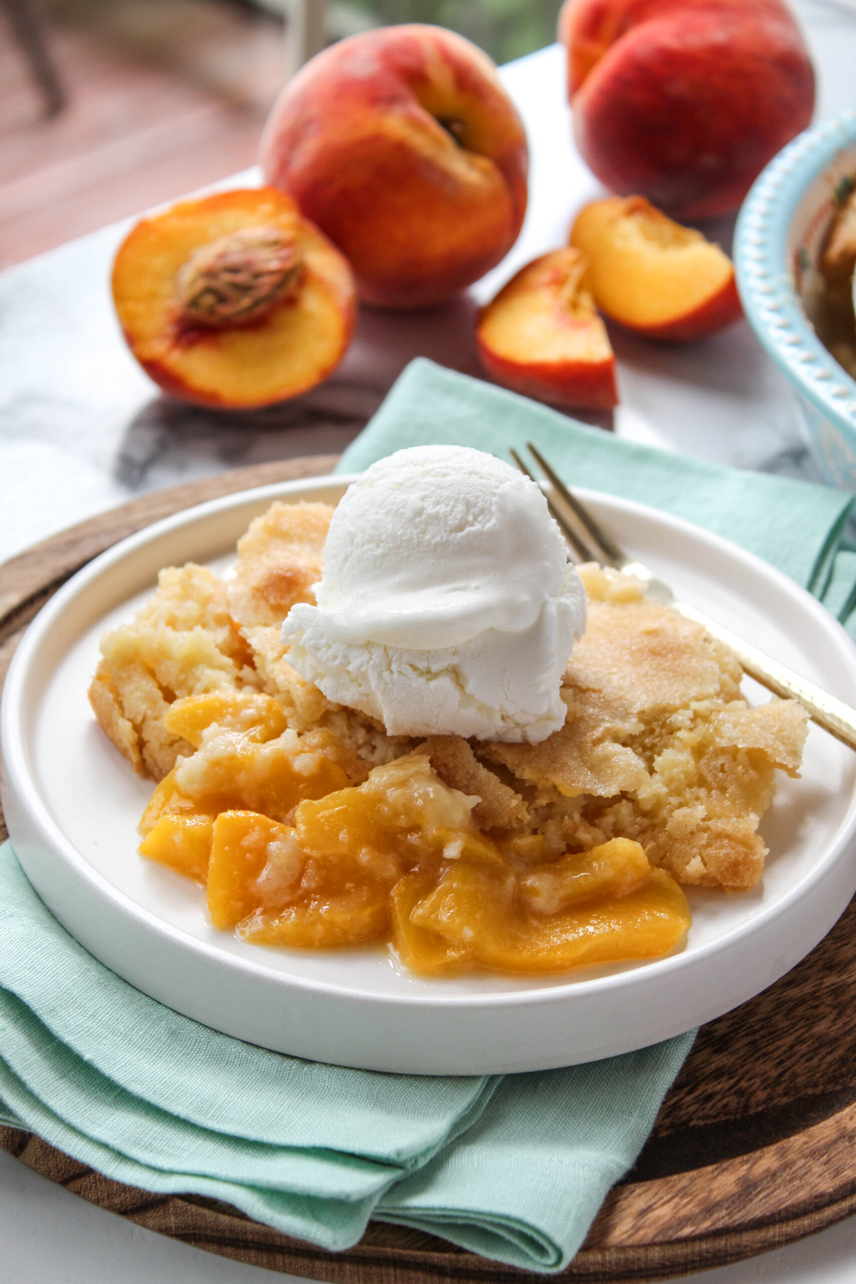 Fresh peach cobbler with juicy peaches and a golden baked crust