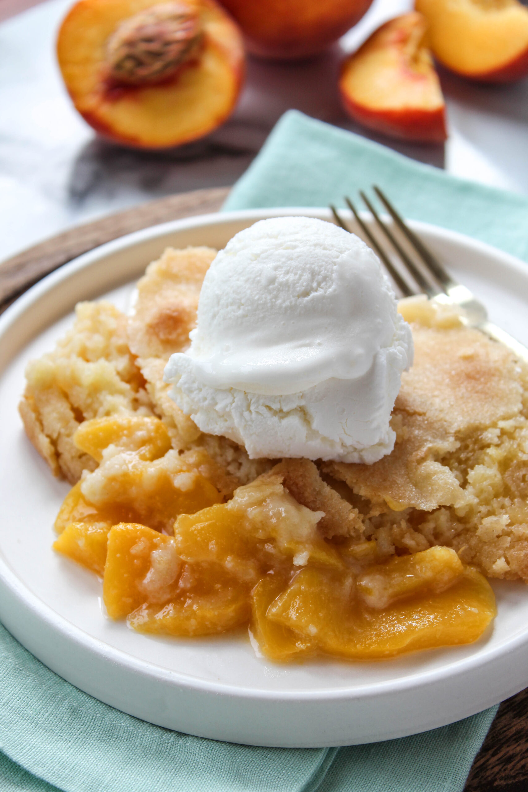 Old‑fashioned peach cobbler with sweet peaches and buttery topping