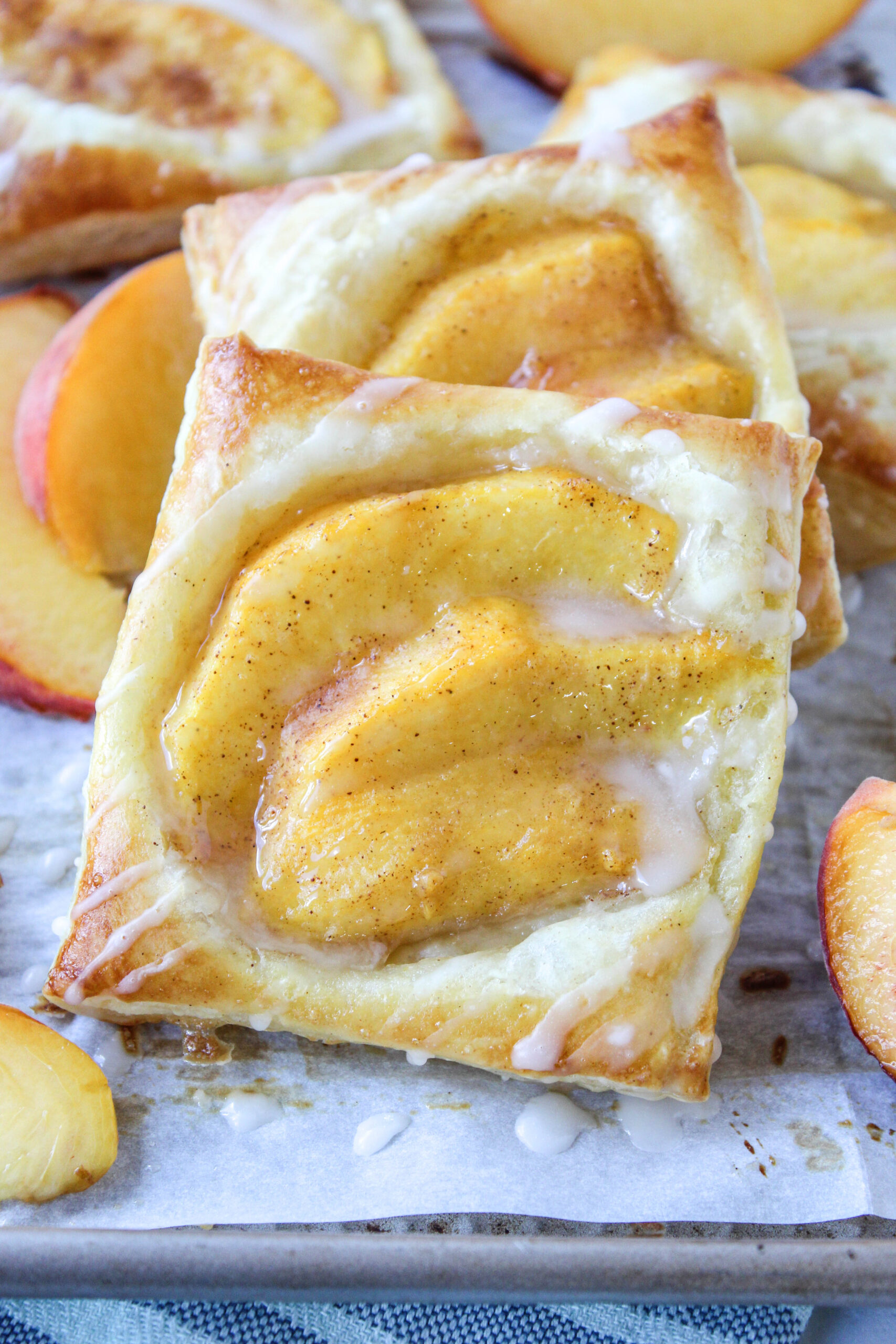 Flaky peach puff pastry tarts