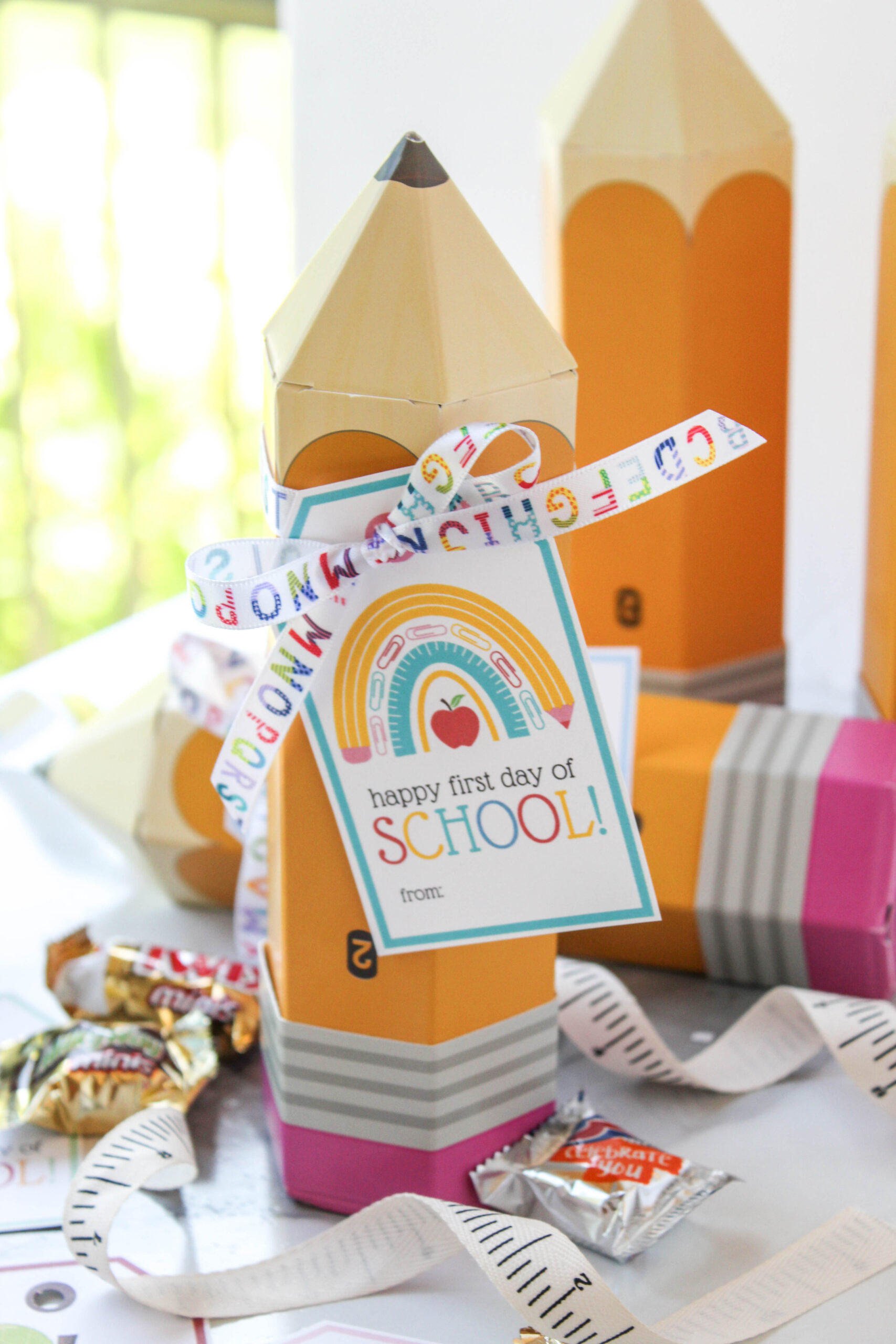 Printable back-to-school gift tag decorated with school supplies and playful lettering