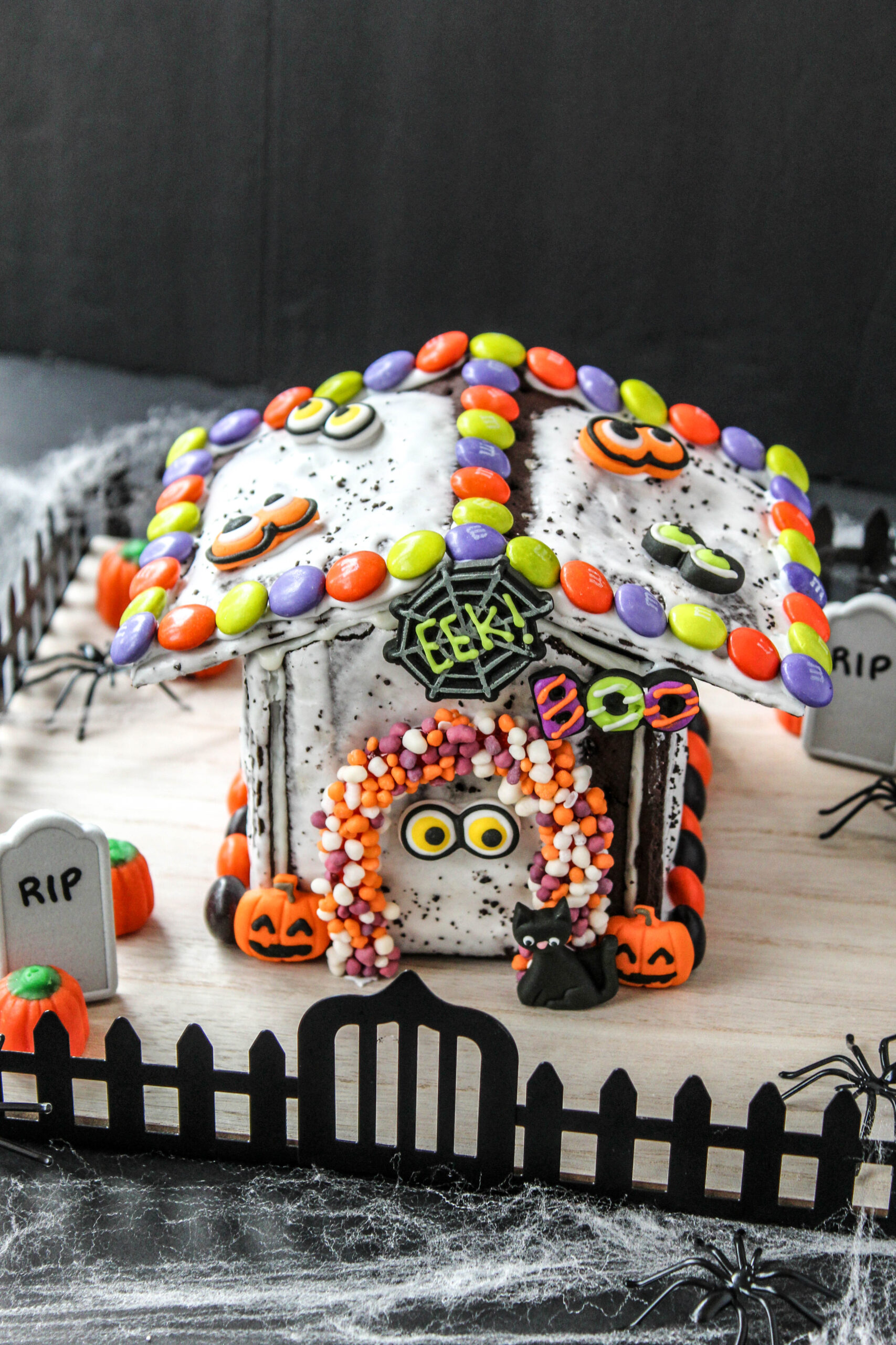 DIY Pop-Tart haunted house with icing roof and candy decorations