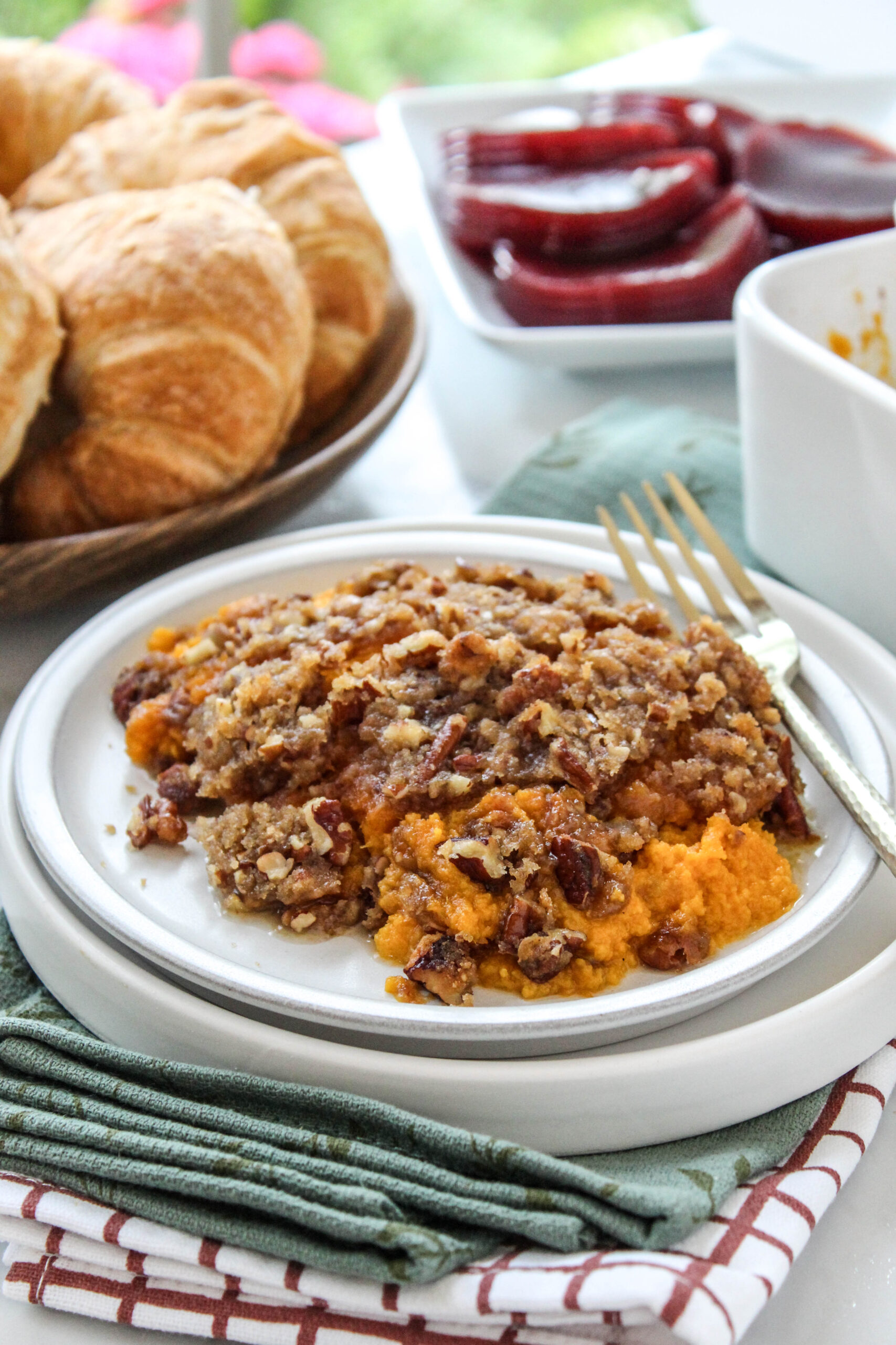 Sweet potato casserole topped with crunchy praline pecan crumble