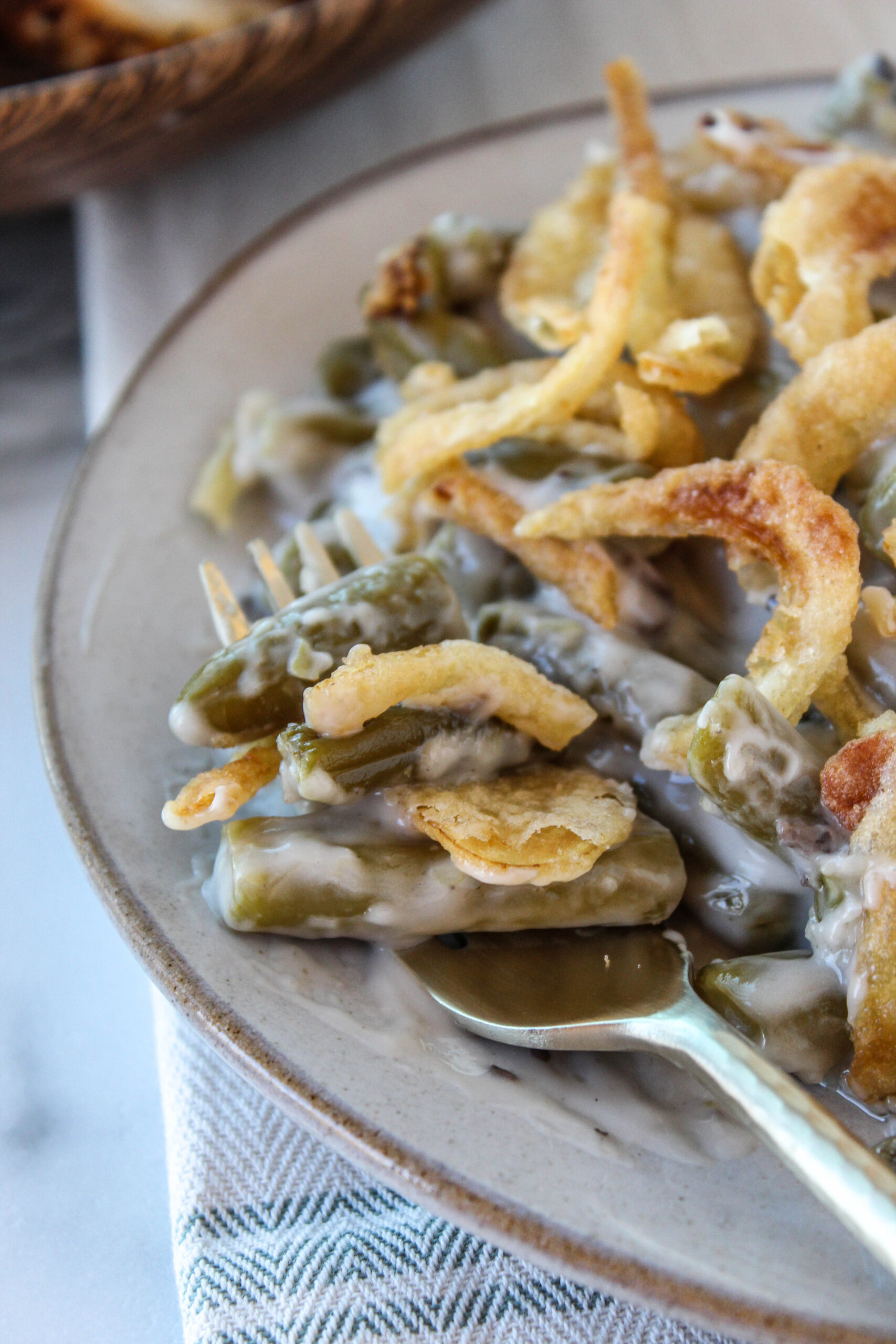 Baked green bean casserole with cream of mushroom and fried onions