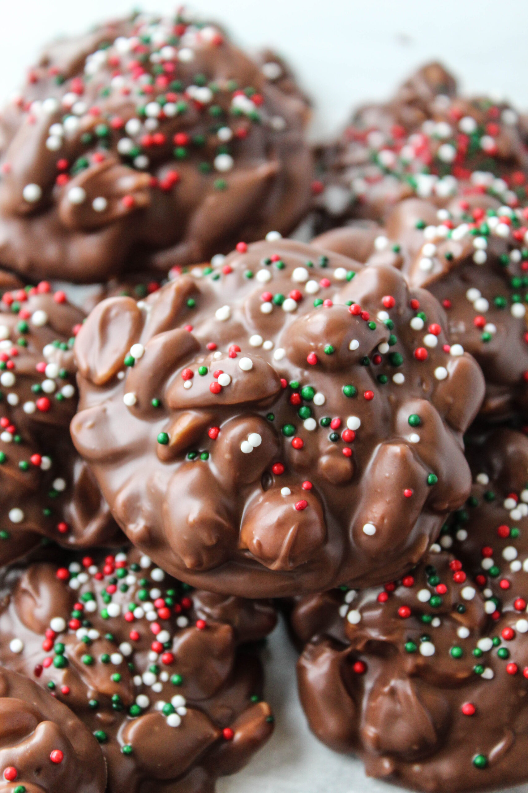 Easy crock pot Christmas crack clusters ready for holiday gifting