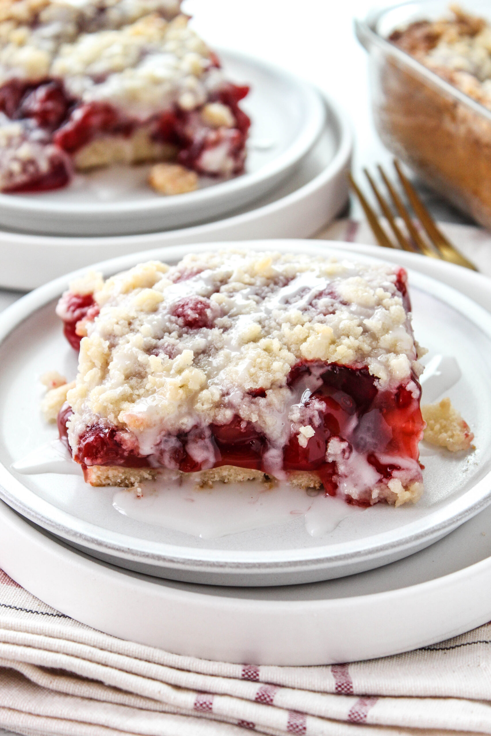 Quick cherry coffee cake topped with a buttery crumb streusel topping