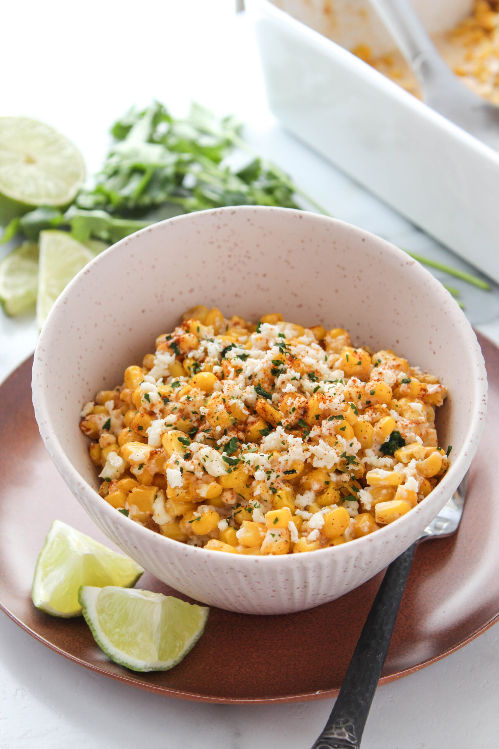 Creamy Mexican street corn casserole baked in a dish