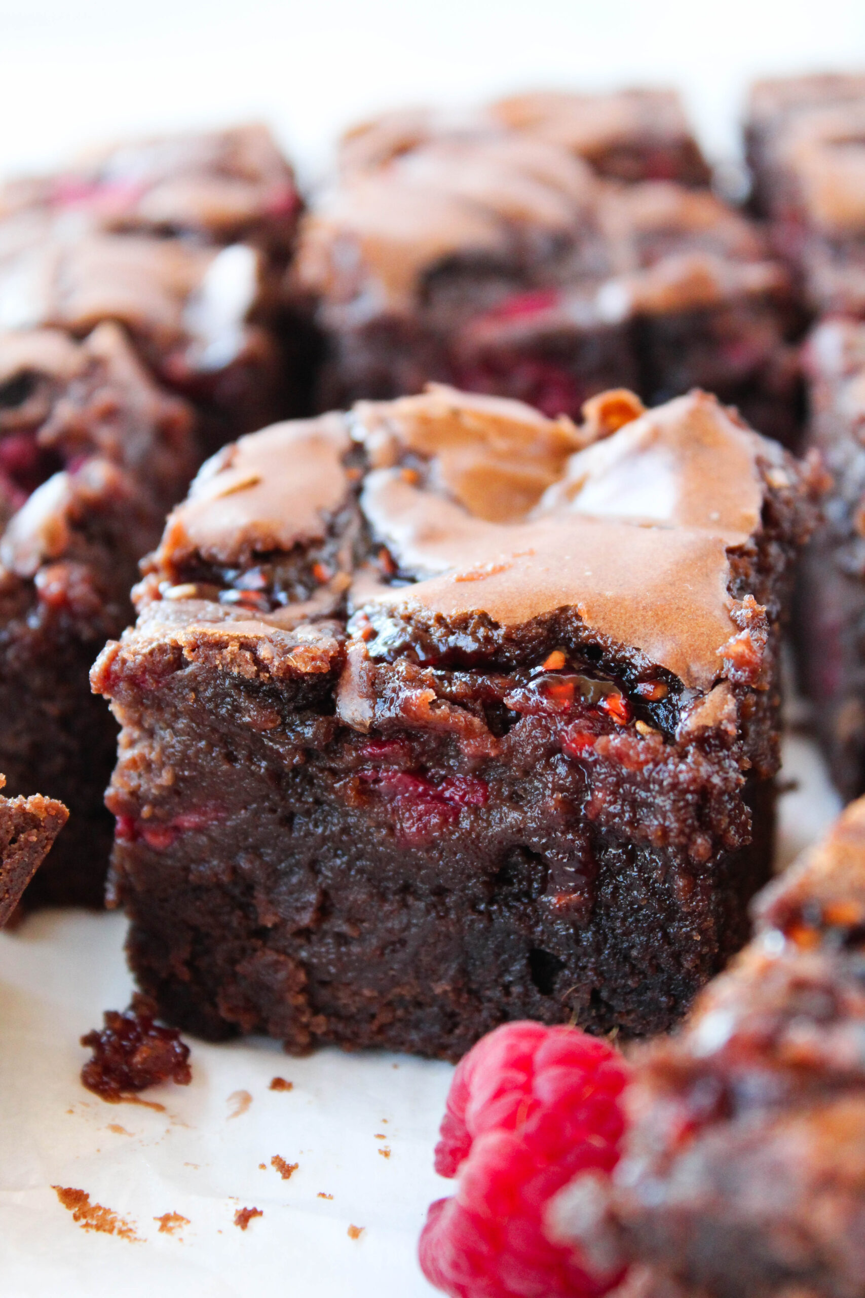 Fudgy raspberry brownies cut into squares
