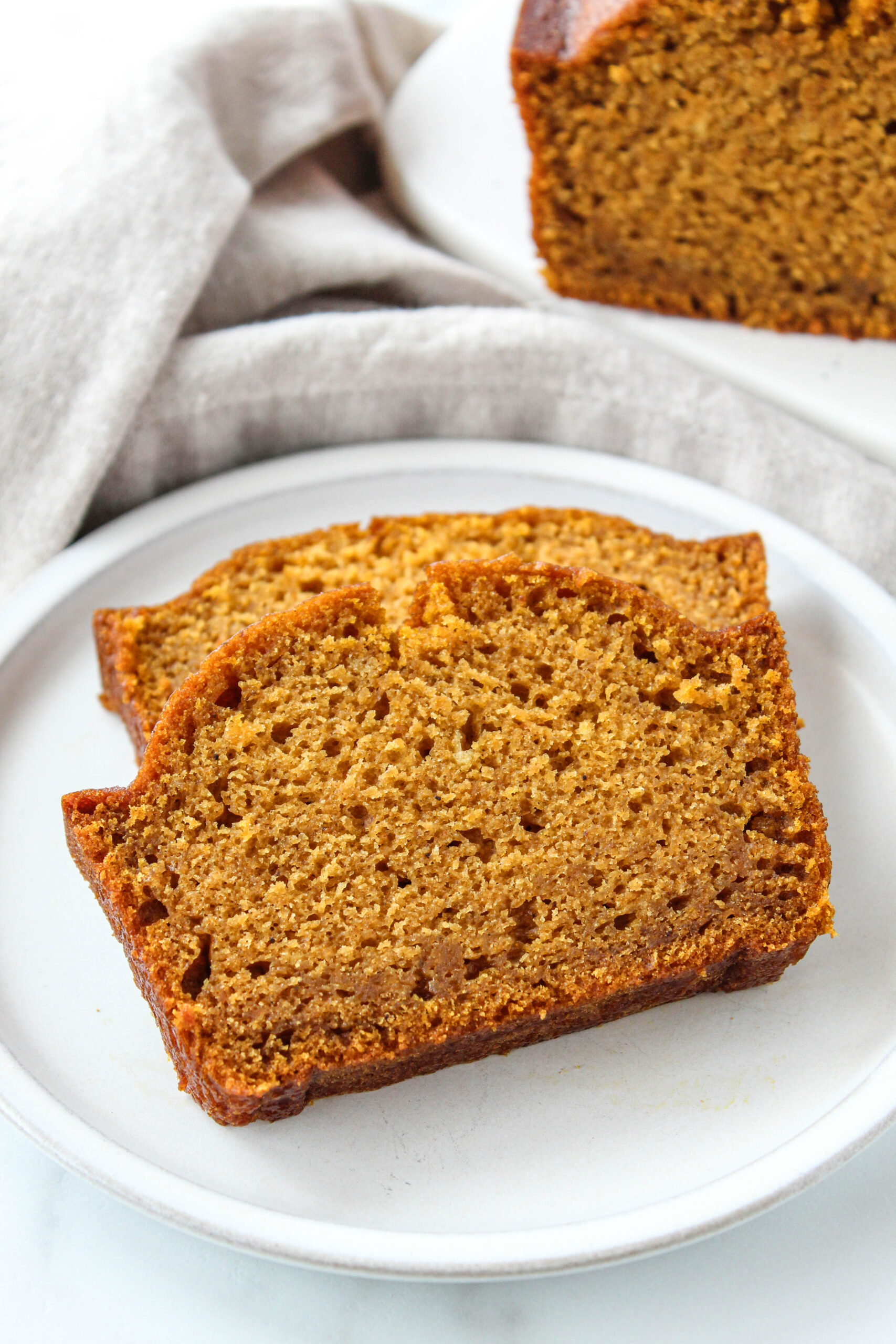 Soft and tender pumpkin bread loaf with a warm, spiced crumb