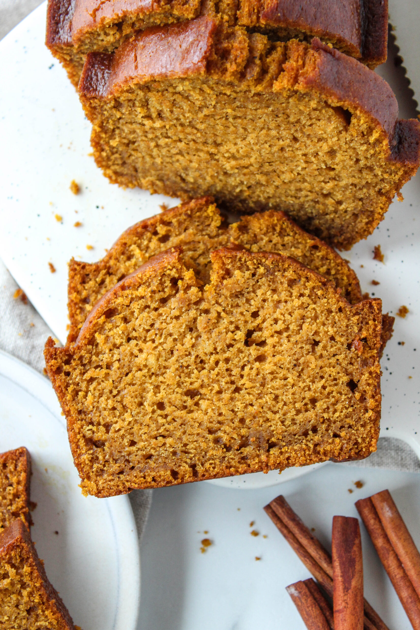 Close‑up of soft pumpkin bread showing its moist, tender crumb