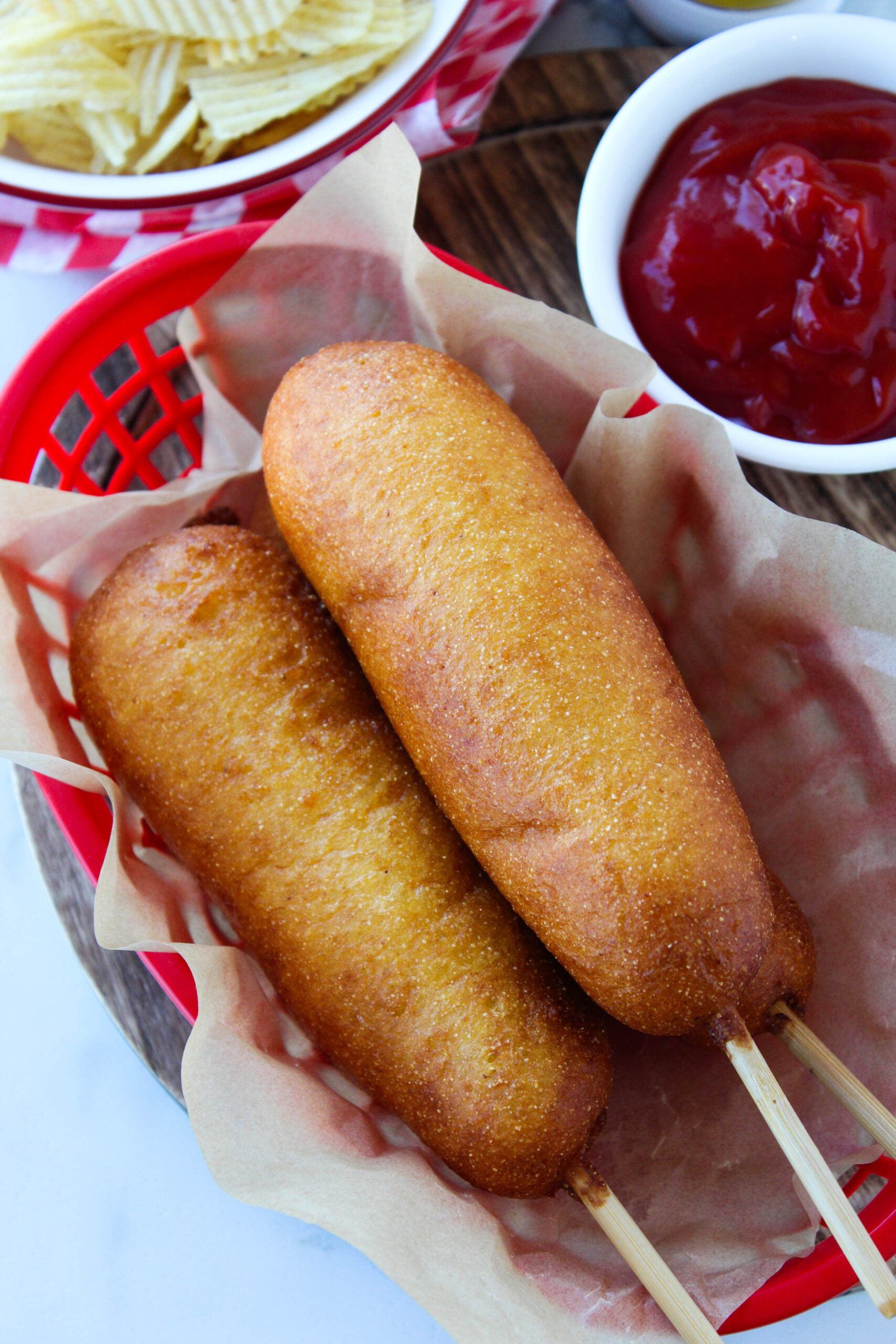 Golden brown vegetarian corn dogs made from scratch with a fluffy cornmeal batter