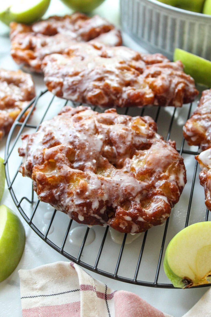 Warm apple fritters with tender apple pieces and golden brown crust