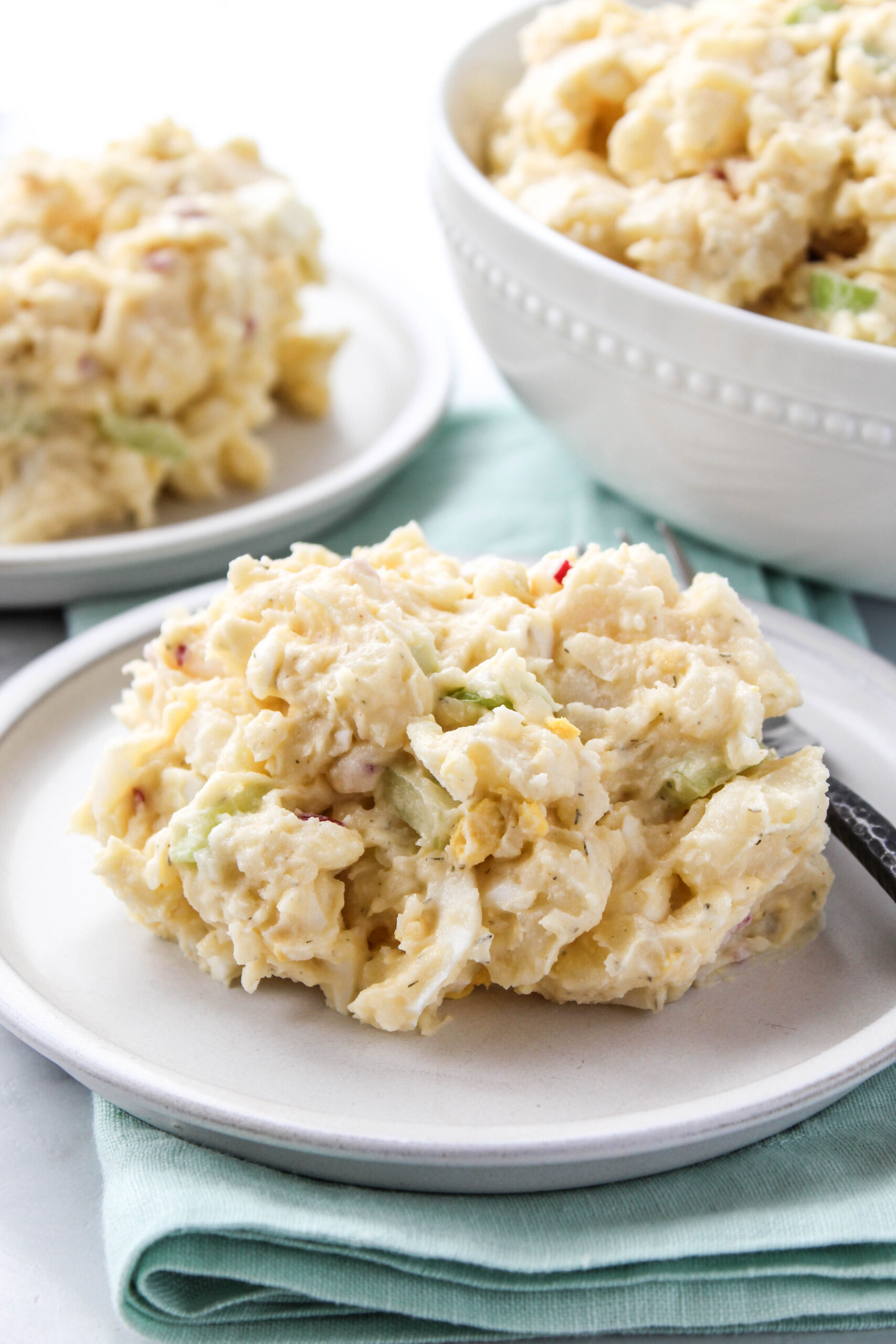 Traditional potato salad with chopped eggs and celery