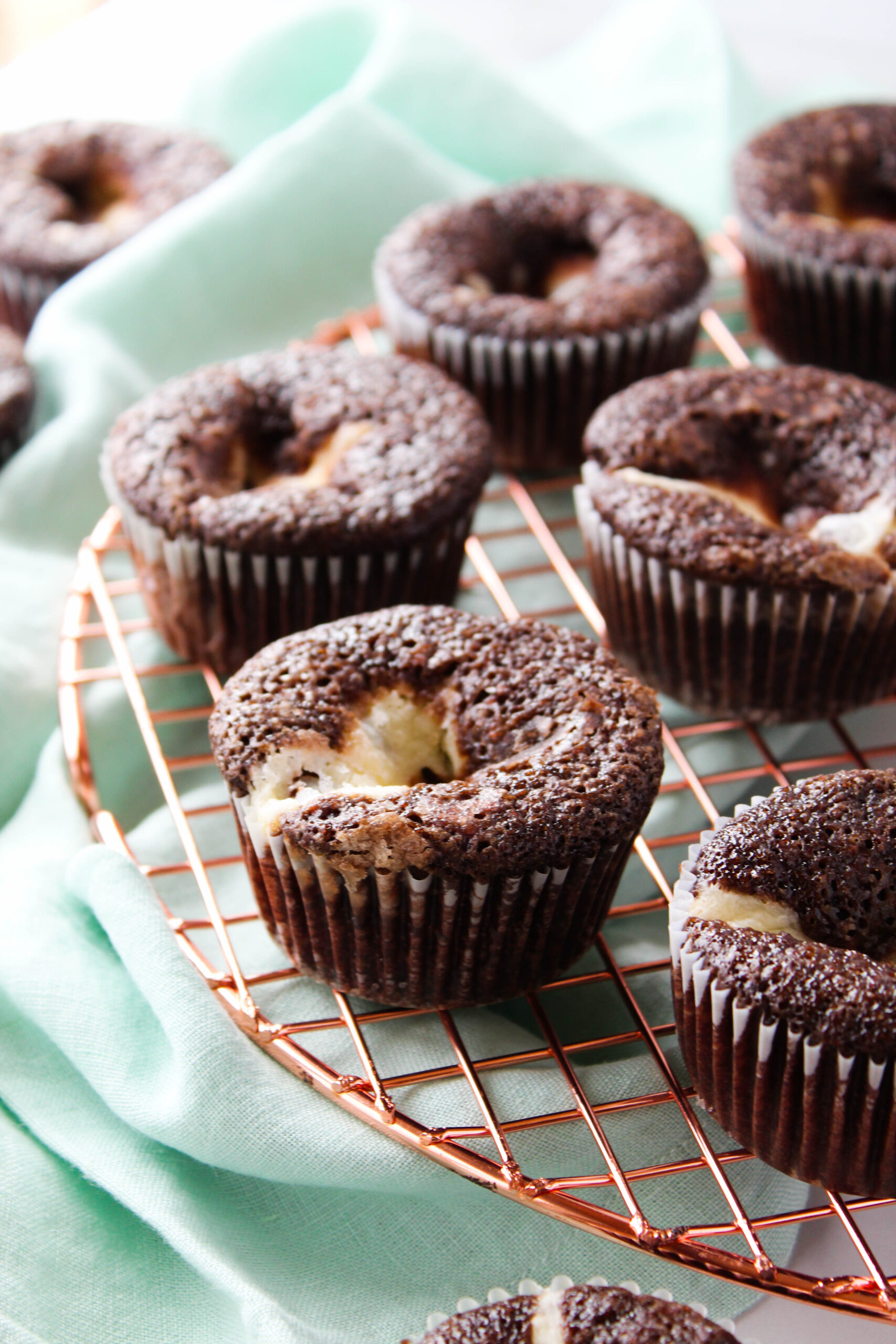 Black bottom cupcakes with creamy cheesecake centers and chocolate chip filling