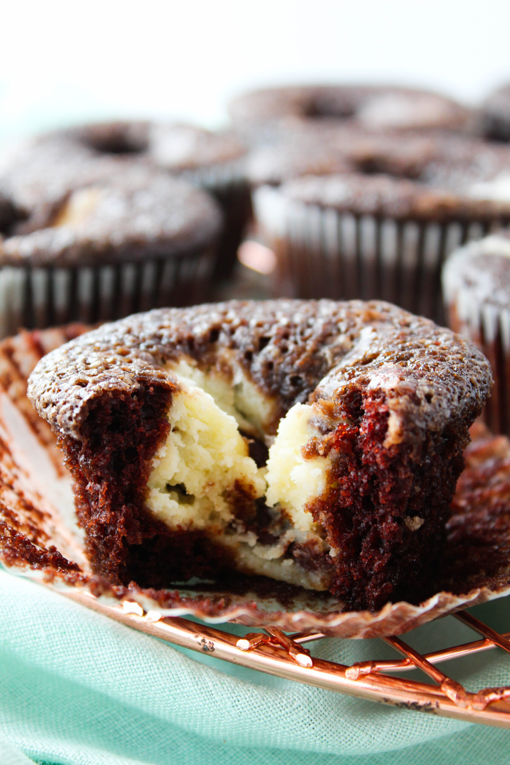 Classic black bottom cupcakes with chocolate cupcake base and cheesecake center