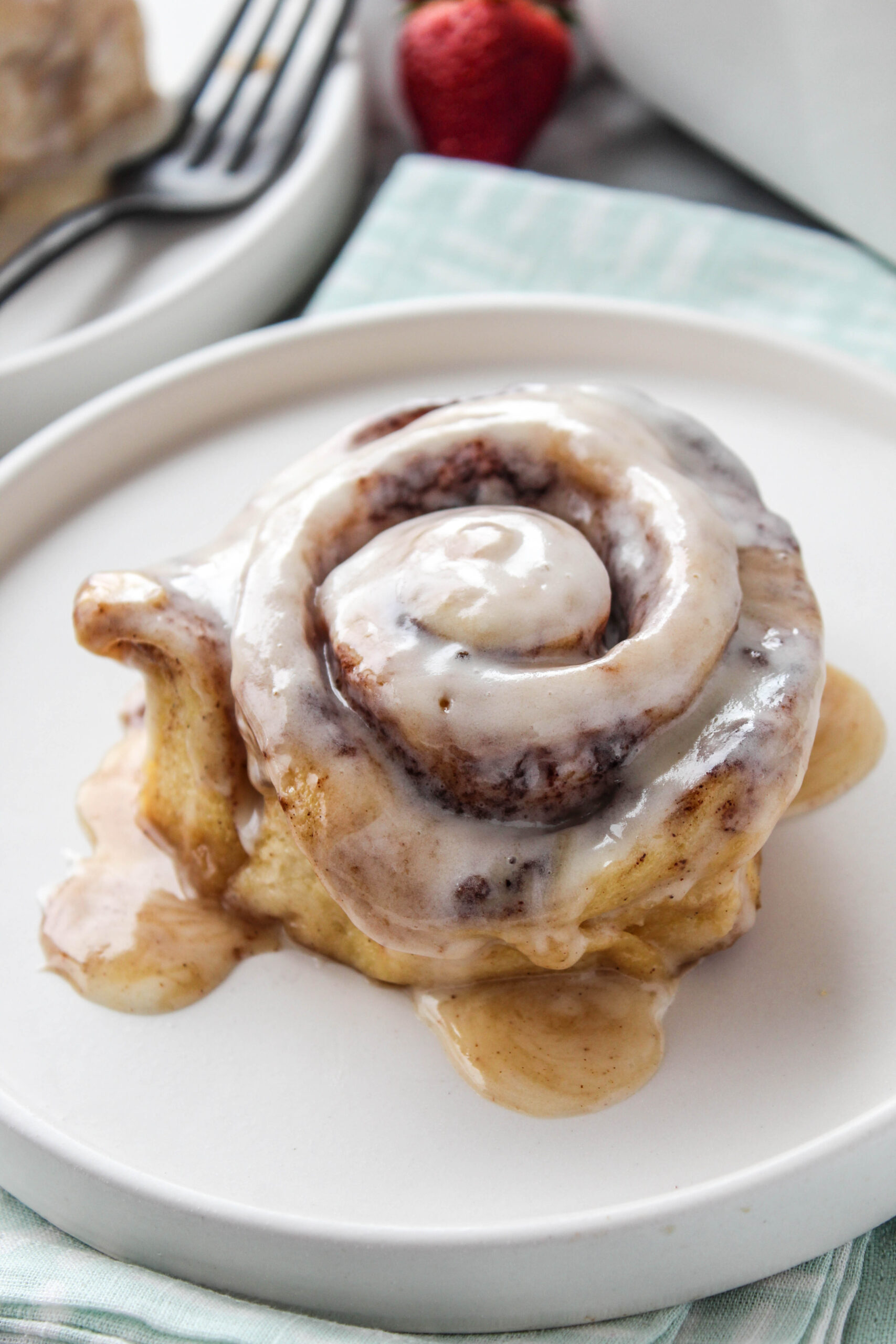 Overhead shot of TikTok cinnamon rolls with thick, glossy icing