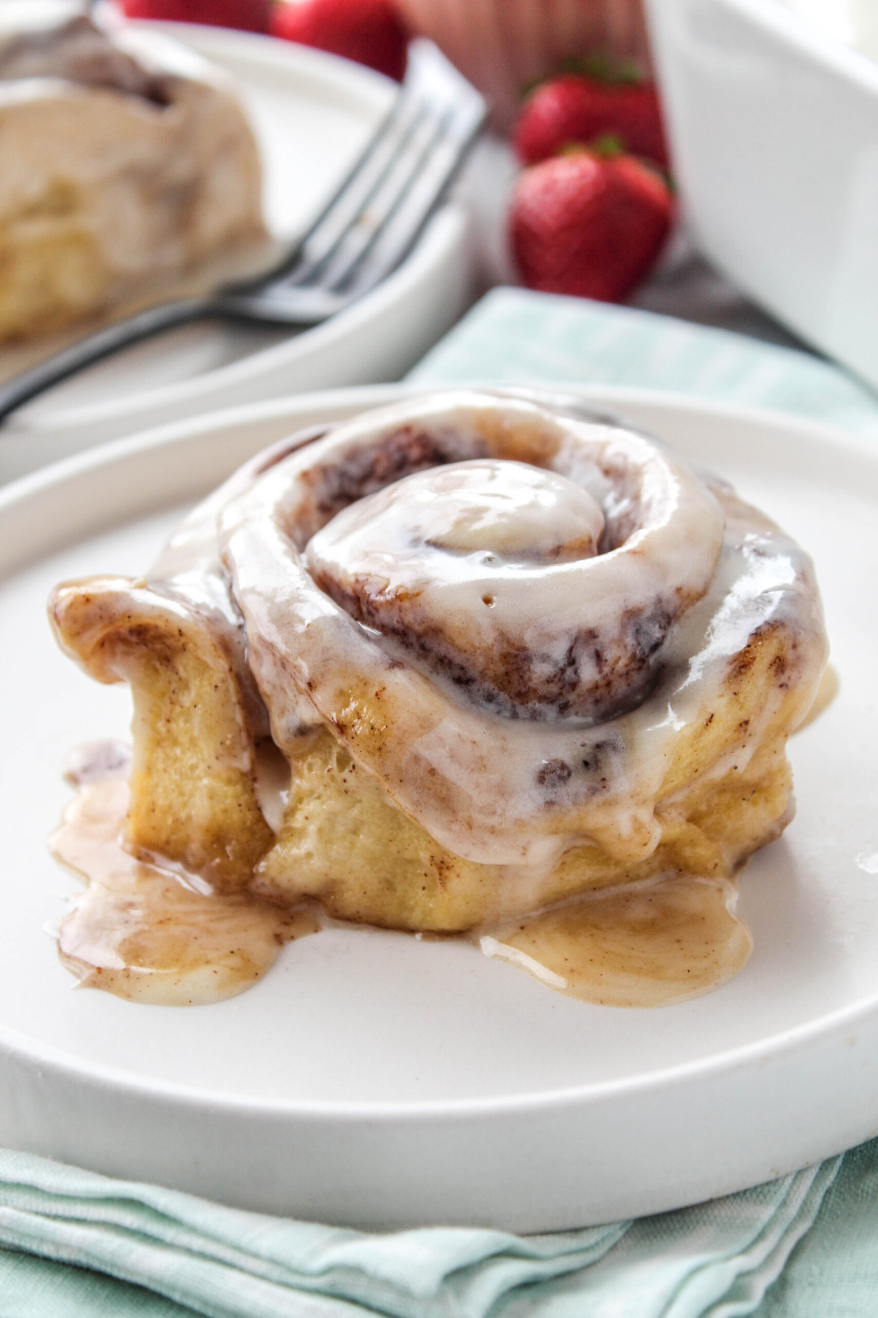 Fluffy cinnamon rolls rising high from the viral TikTok method