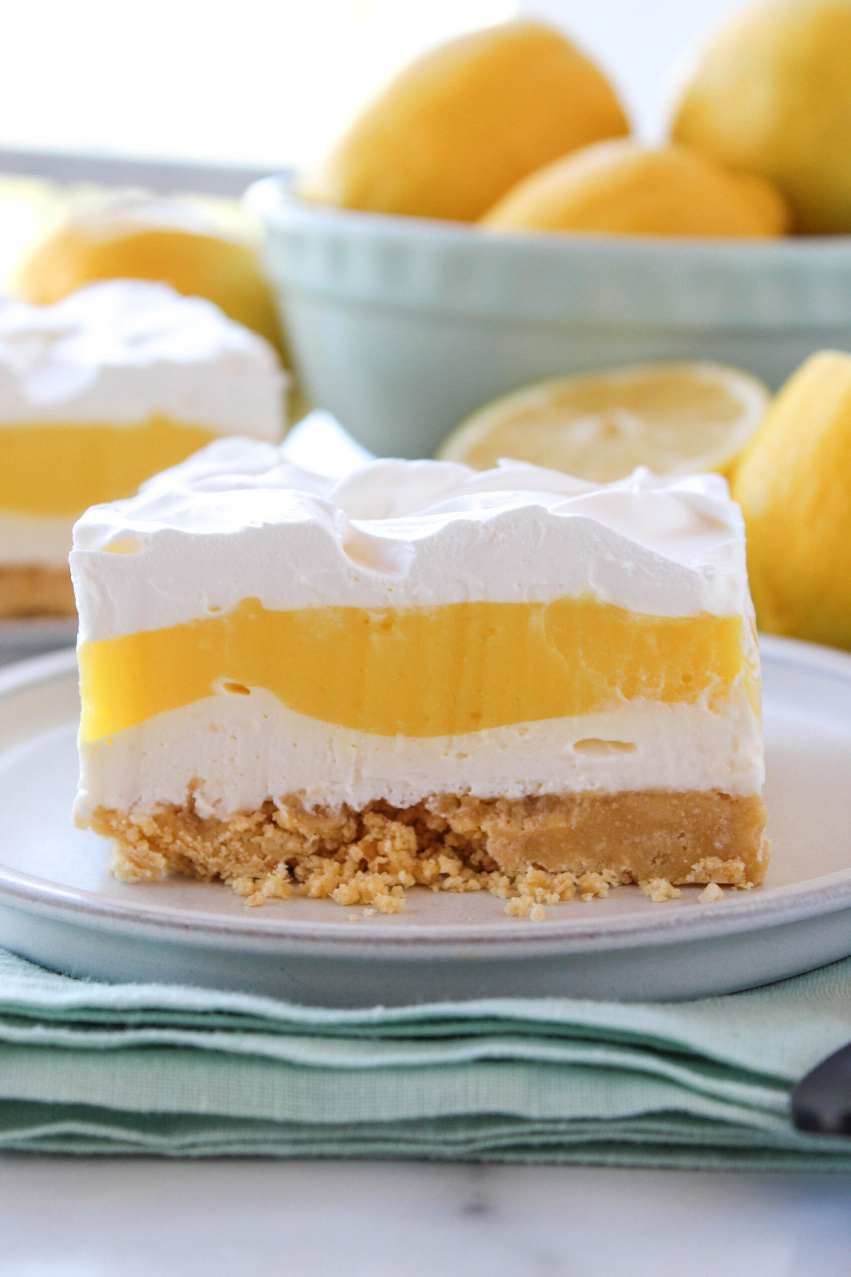 Easy no-bake lemon lasagna with layered lemon pudding, cream cheese, and whipped topping
