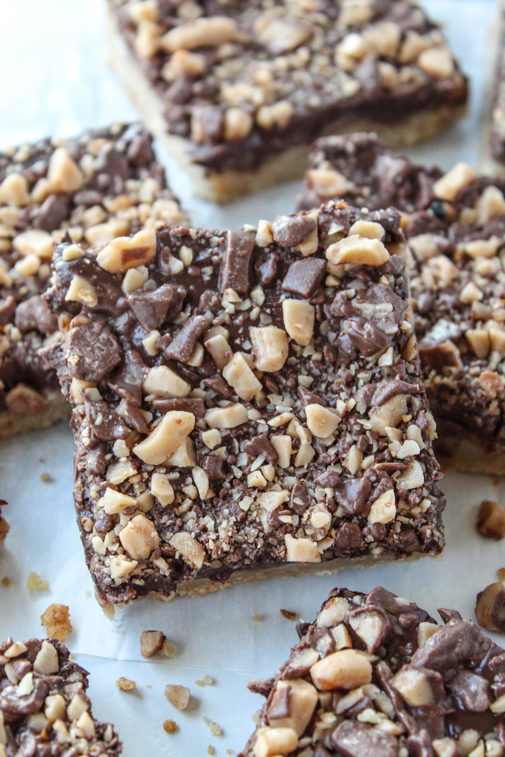 Buttery toffee bars layered with melted chocolate and sprinkled with toffee bits