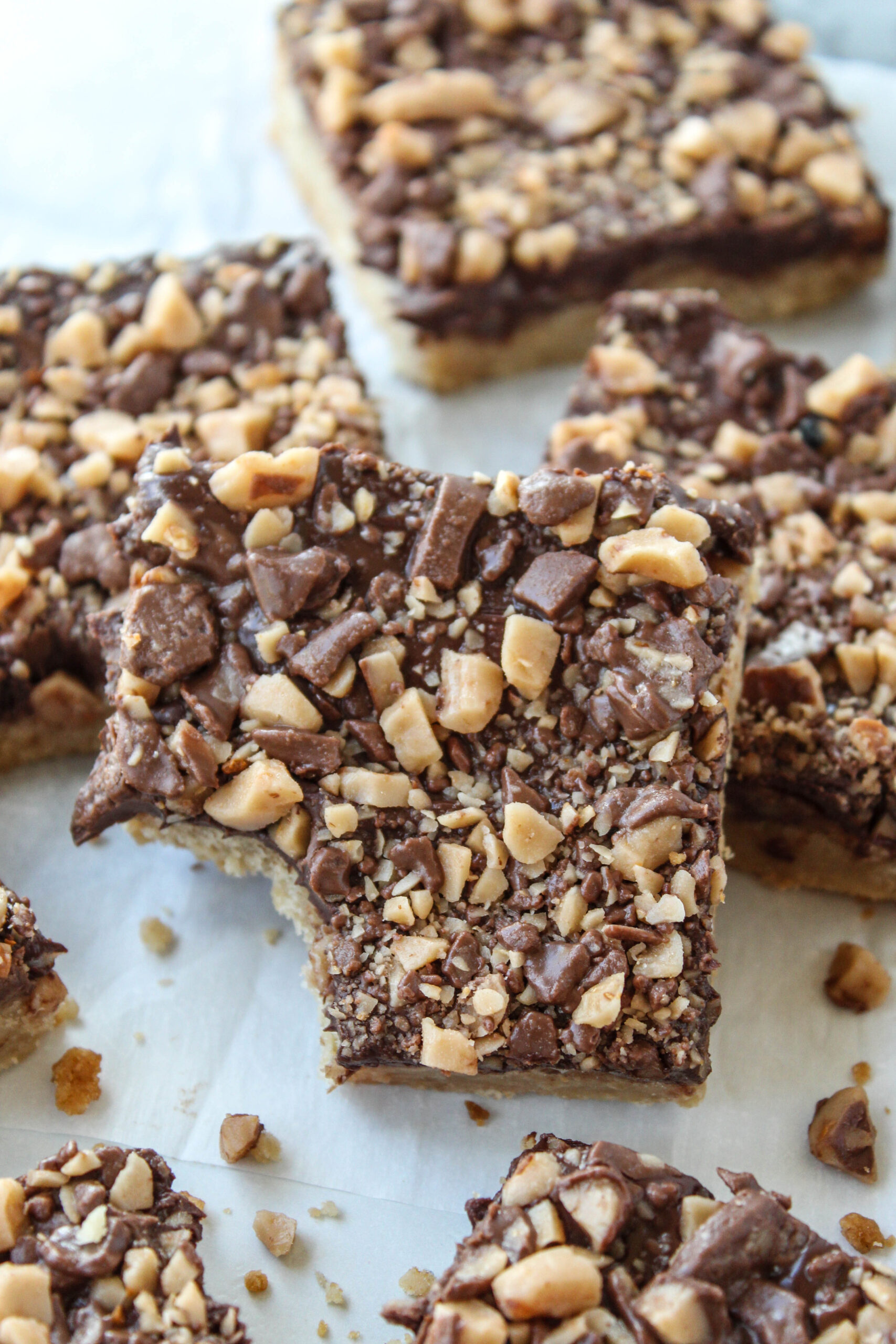 Rich chocolate toffee bars cut into squares