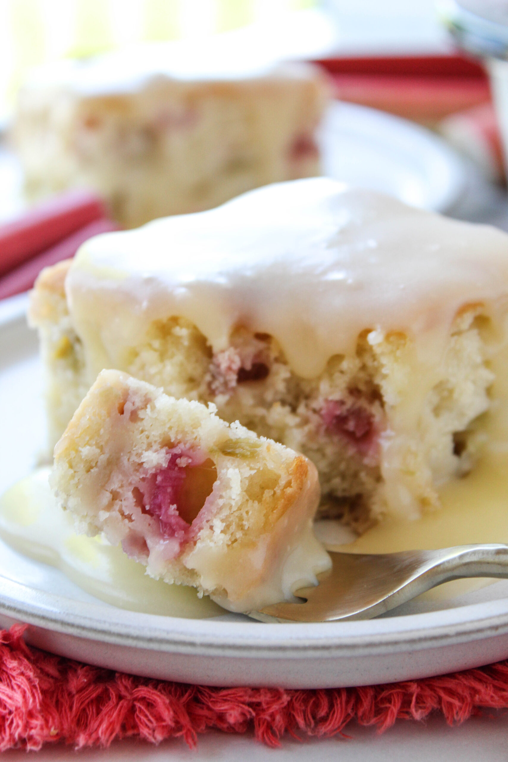 Old‑fashioned rhubarb cake served with rich butter sauce