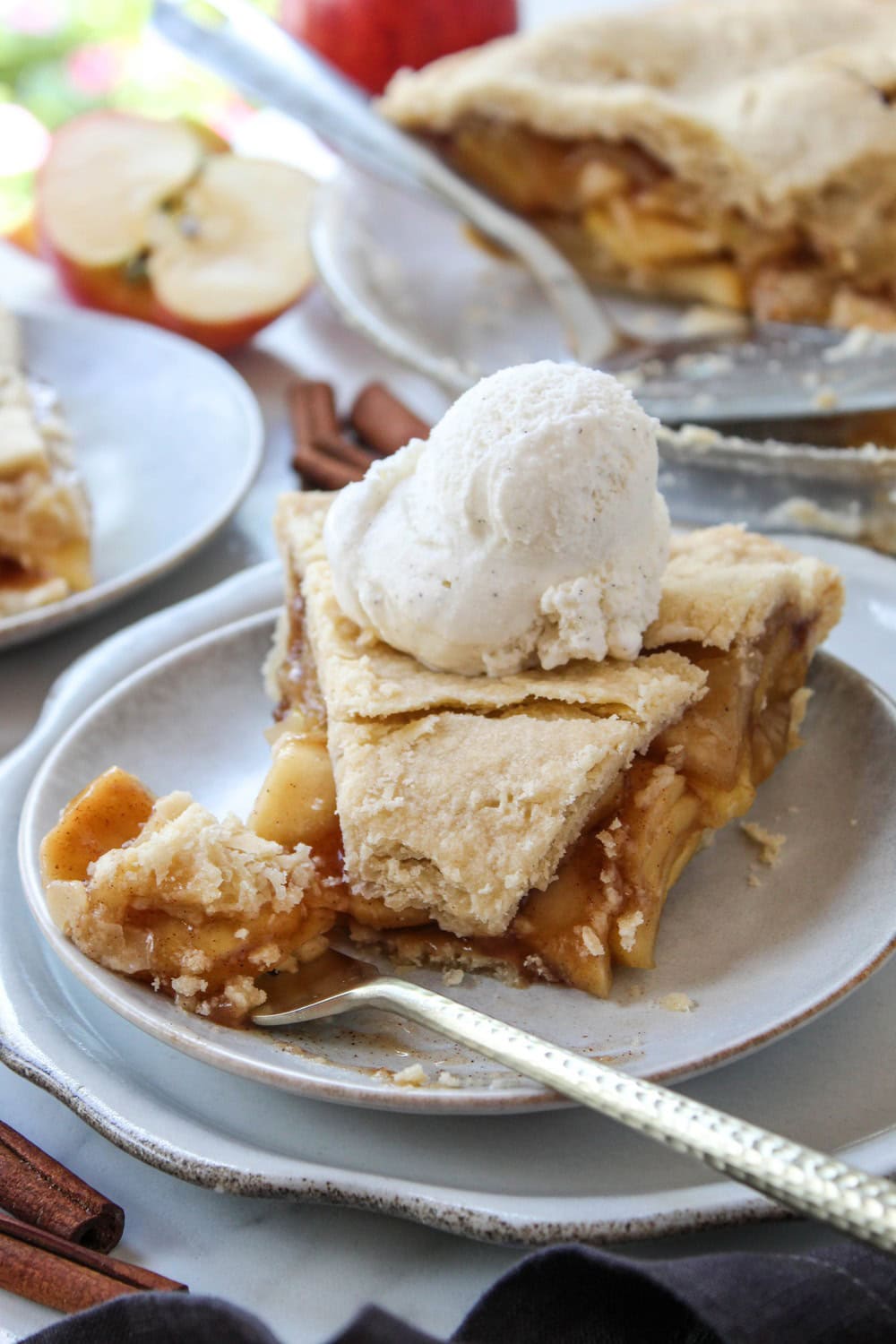 Easy apple pie served warm with visible cinnamon‑spiced apple layers