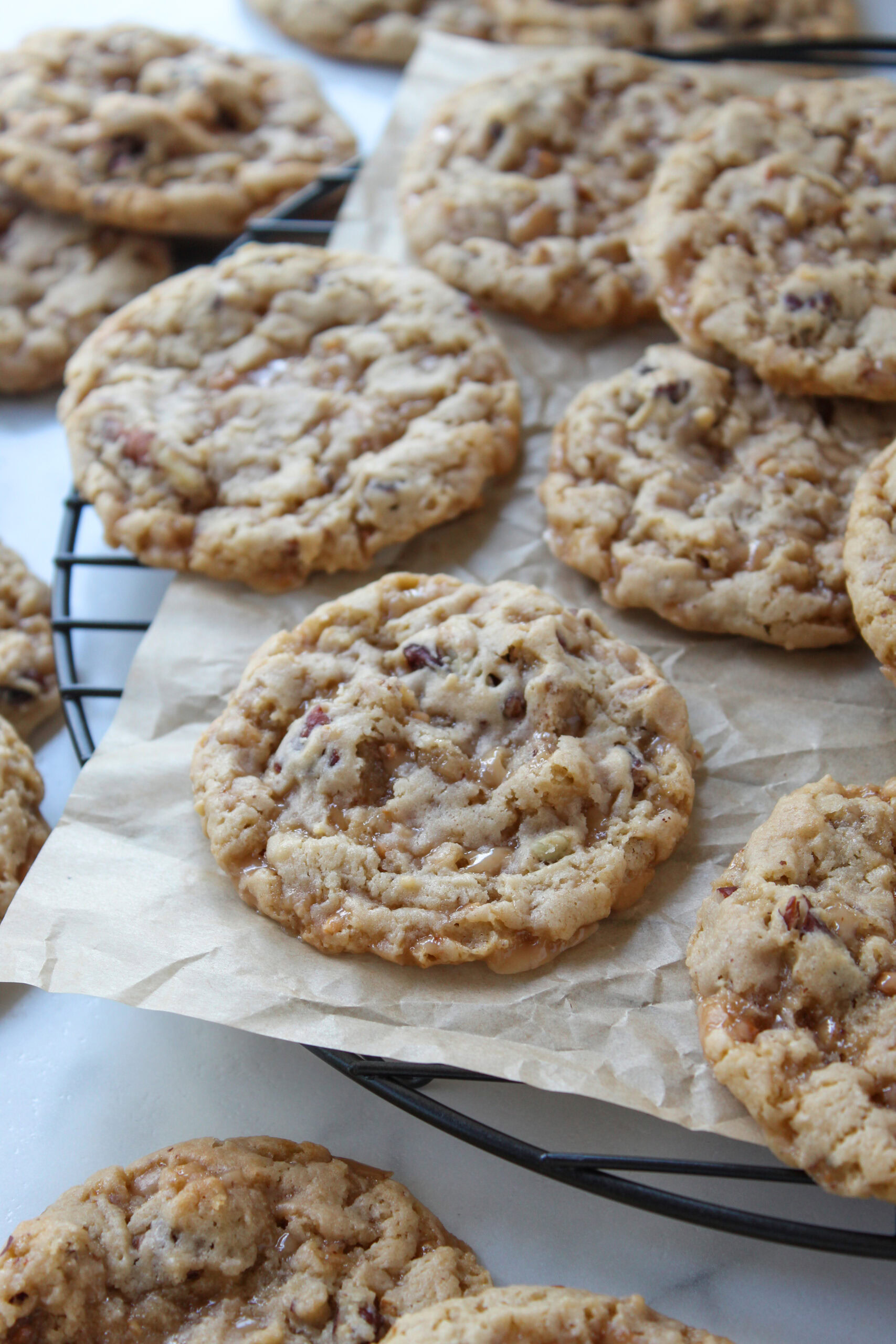 Soft and chewy toffee butter pecan cake mix cookies with crunchy pecan pieces