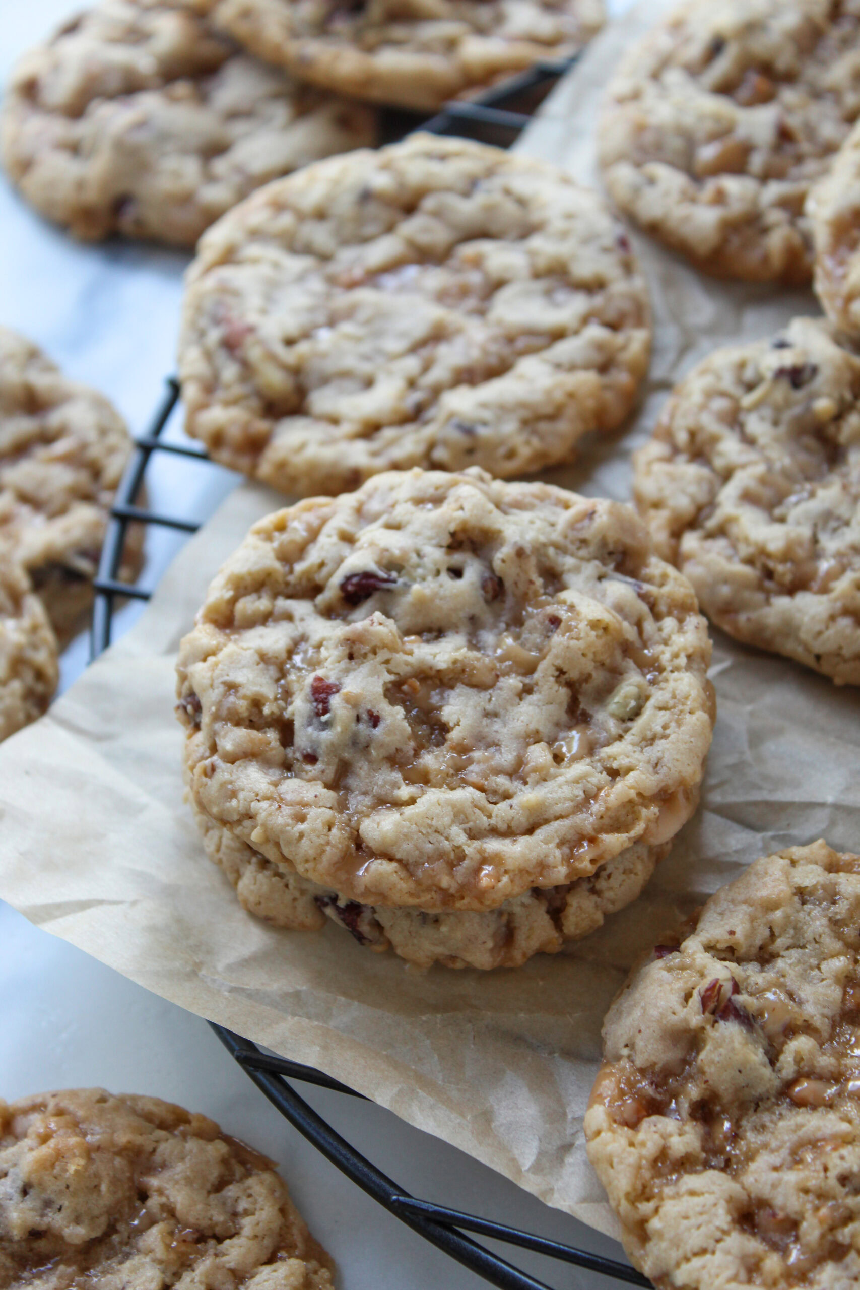 Freshly baked toffee butter pecan cake mix cookies cooling on a wire rack