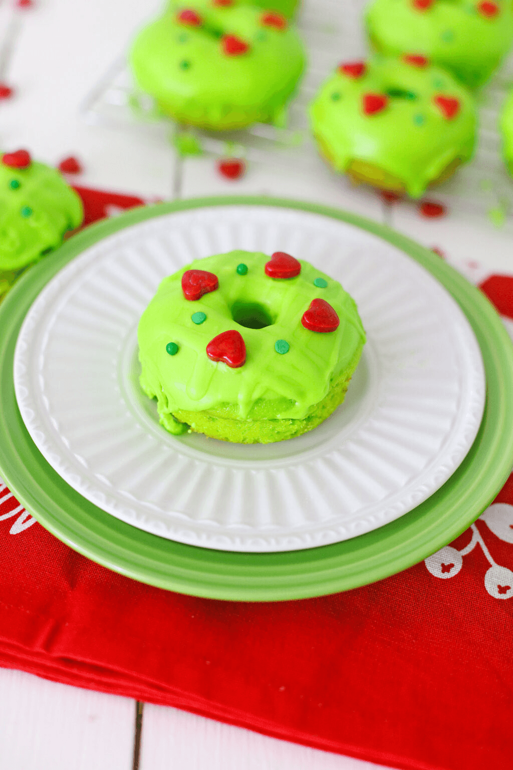 Festive Grinchmas treats served on a holiday dessert table