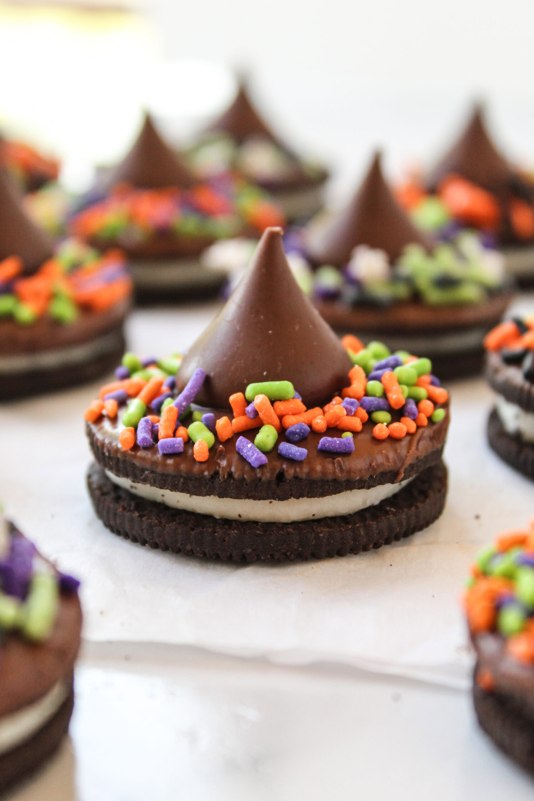 Oreo witch hat cookies decorated with chocolate kisses